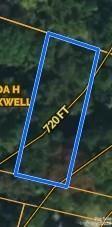 Lot for sale. Seller now owns property and has clear title and a policy. Seller will consider owner financing with $10,000.00 down payment