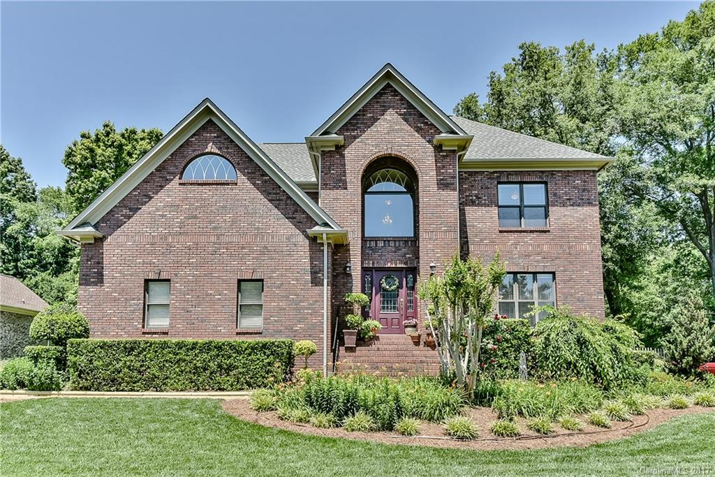 Home is where the heart is and this beautiful brick 4 bedroom shows that loving care.Wonderful curb appeal. Exquisite yard.Interior offers flowing design w/island kitchen open to family room,formal living and dining.Master suite w/sitting area and sumptuous bath w/dual shower and whirlpool tub.Hardwood throughout main,granite kitchen w/stainless appliances,custom cabinets.Tile baths.9 foot ceilings up and down.Crown moldings. Builtins. Pella Windows.Recent HVAC,Large rear deck.Oversize garage.