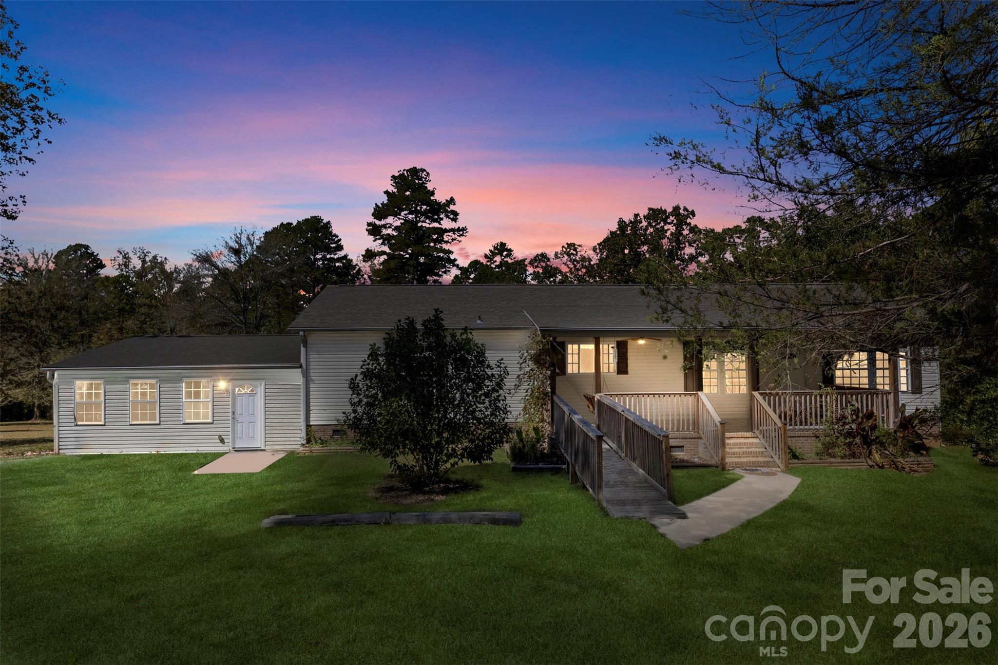 MOTIVATED SELLER : Tucked away on 2.15 acres along a quiet private road in York, this charming property combines peaceful country living with the convenience of modern amenities. Built in 2004, the main home offers approximately 1,800 square feet of comfortable living space, featuring 3 bedrooms, 2 bathrooms, and an inviting open-concept layout designed for everyday living and entertaining.

A standout feature of this property is the attached apartment/in-law suite, complete with its own private entrance, kitchen, laundry area, and full bathroom—ideal for multi-generational living, hosting guests, or creating an income-producing rental opportunity.

Located outside city limits with no HOA restrictions, you'll enjoy the privacy and freedom that are increasingly hard to find. With more than 2 acres of land, there's plenty of room for gardening, recreation, animals, or simply enjoying the tranquility of your own private retreat.