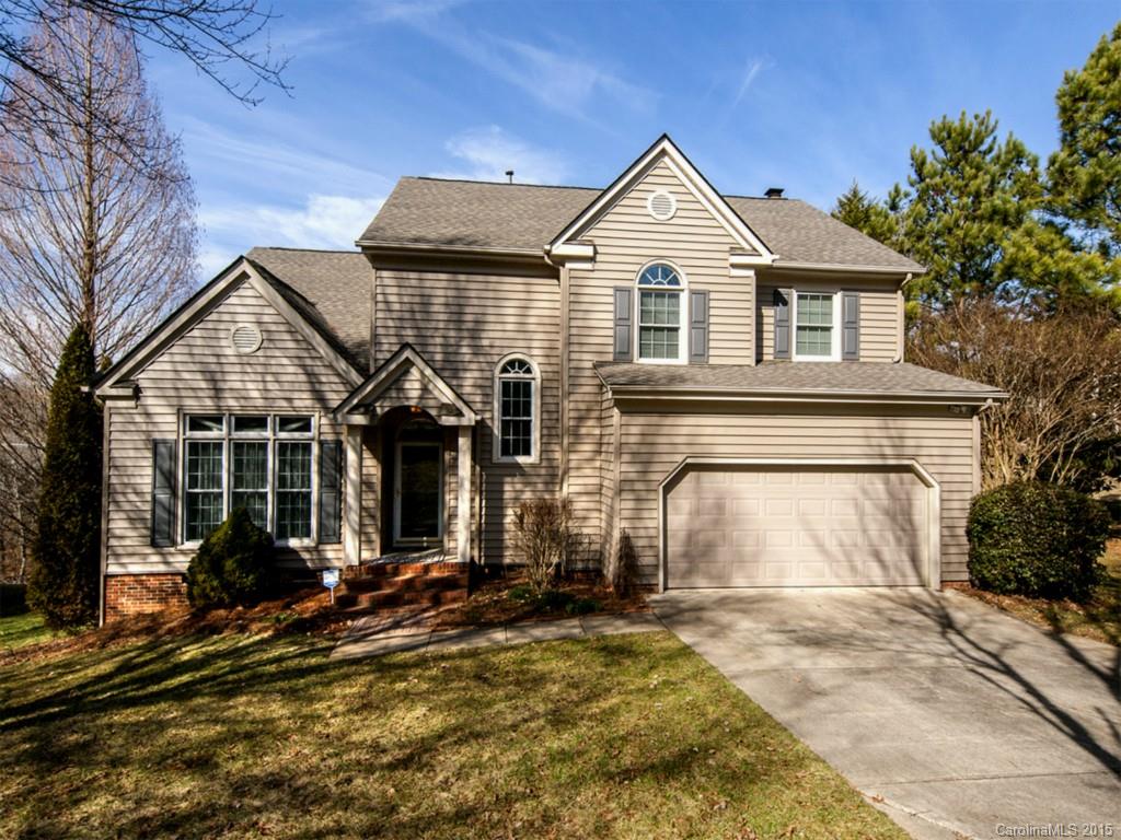 Beautiful home in prime location near UNCC, shopping, hospital and restaurants .  Gorgeous hardwood floors flow through the main floor.  Kitchen opens to great room with functional island.  Large Sun room is perfect for enjoying the view of the tree lined landscaped back yard.  Four large bedrooms upstairs.  Master suite has vaulted ceilings and 5 piece master bath.  Custom built-in shelving system in the huge walk-in closet.  Tons of storage in the tall walk-in crawl space.