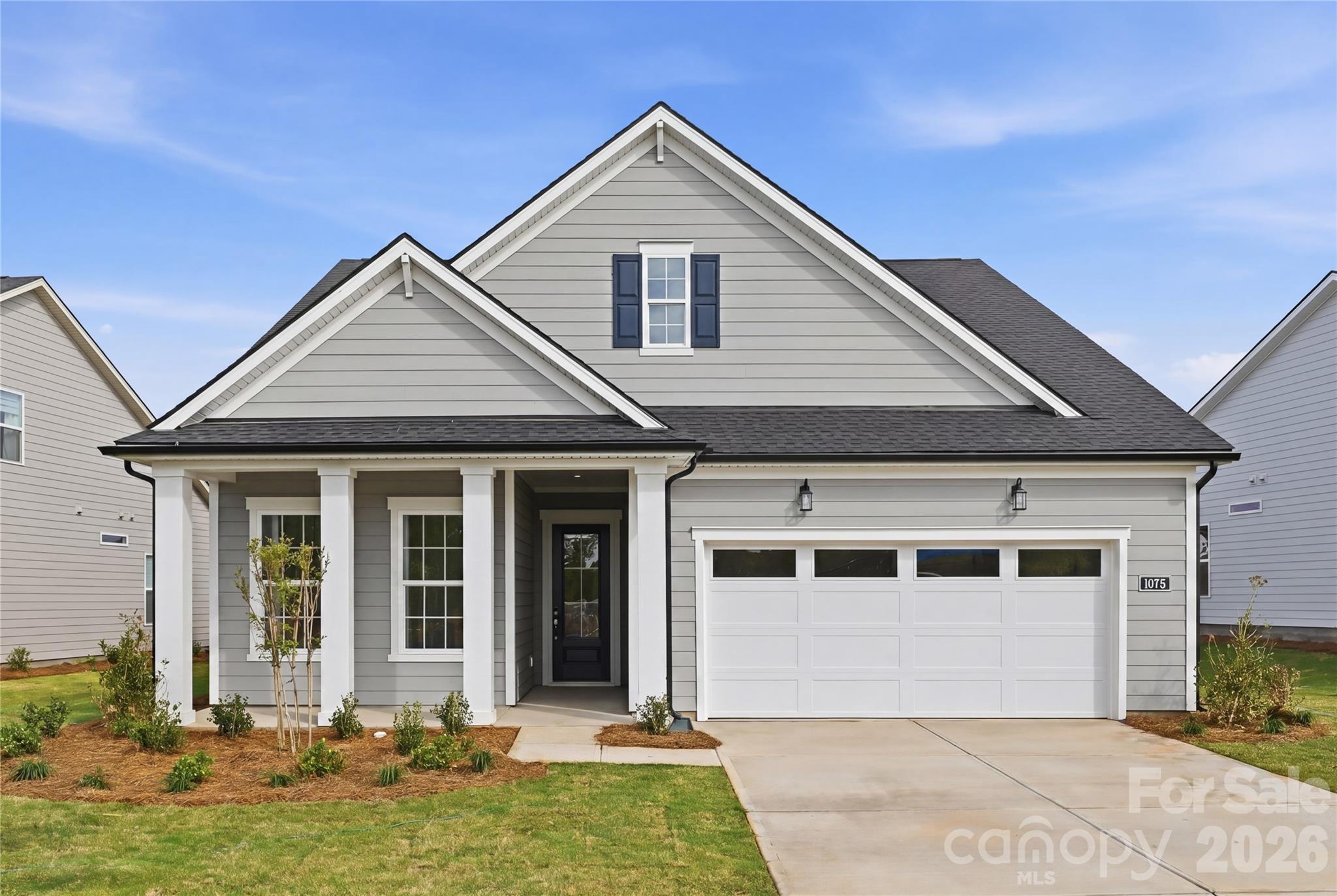 Move-In Ready with Designer-Appointed Finishes and Exceptional Value! This beautifully crafted Dilworth home on homesite #214 combines effortless luxury with thoughtful design. A welcoming foyer opens to a versatile flex space, perfect for a home office, hobby room, or additional living area. The open-concept layout flows seamlessly into the spacious great room and casual dining area, creating an ideal setting for both everyday living and entertaining.

At the heart of the home, the well-appointed kitchen features a large center island with breakfast bar seating, abundant cabinetry and counter space, a generous walk-in pantry, and a convenient workspace. The private primary suite offers a peaceful retreat with an expansive walk-in closet and a spa-inspired bath featuring dual vanities, a luxe shower with built-in seat, linen storage, and a private water closet. A secondary bedroom and full bath provide comfortable accommodations for guests.

Additional highlights include a covered patio for outdoor enjoyment, a centrally located laundry room, an everyday entry, and ample storage throughout.

NOW OPEN - Residents enjoy access to a spectacular resort-style amenity campus featuring a clubhouse, five pickleball courts, tennis courts, bocce, fitness center, pool, outdoor spa, and more. Experience the low-maintenance lifestyle you've been waiting for in one of the area's premier active-adult communities. Pricing subject to change.