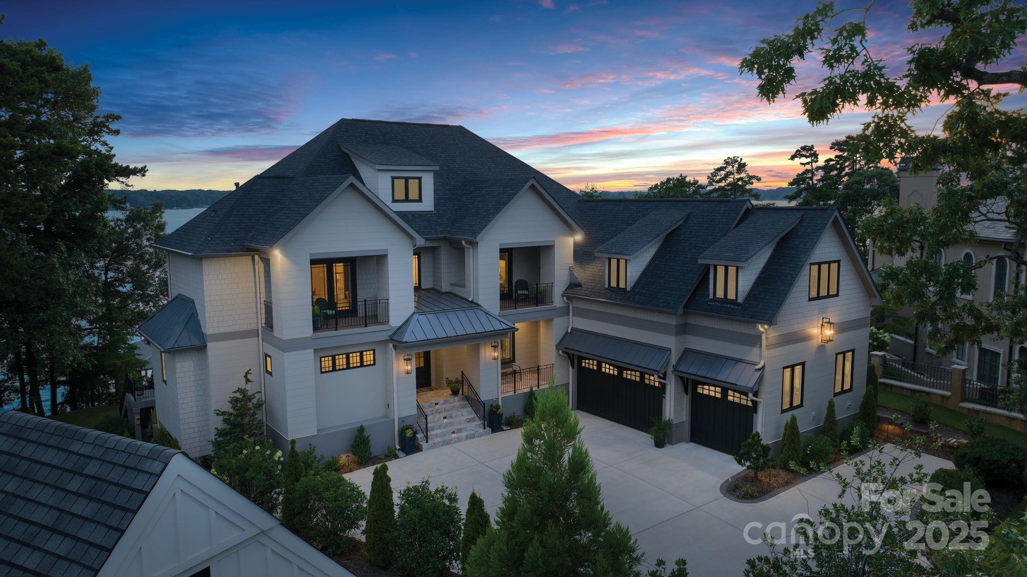 You will be In AWE at this WATERFRONT ESTATE w/mile-long views! Renovated 2019, this stunning home offers too many upgrades to mention (see attachment/picture descriptions). With the Open Floorplan you will experience the EXPANSIVE WVIEWS from almost every room! MAIN FLOOR features: Incredible Primary Suite w/ Ensuite Bath & Custom Closet, 2 story Great Room-custom fireplace & wall of windows, Dining Room-perfect for a Grand Piano entertaining area, Impressive Chef's Kitchen-Custom Range Hood, Wolf/Sub-Zero appliances, Scullery, oversized island/bar seating; WF Breakfast area; & ELEVATOR. Upper Level: 3 Secondary Bedroom Suites; Glass French Doors to the Study, & access to the Bonus/Bedroom/Workout Room w/ Beverage Bar. Lower Level: Golf Simulator w/full-swing software; Pool Table area, Living Room w/Full Bar, & Bedroom Suite. From the accordion patio doors walk to the deck w/Infinity Pool/Spa, outdoor eating area, WF Putting Green, & Private Lancaster Covered Dock/Pier & Lift.