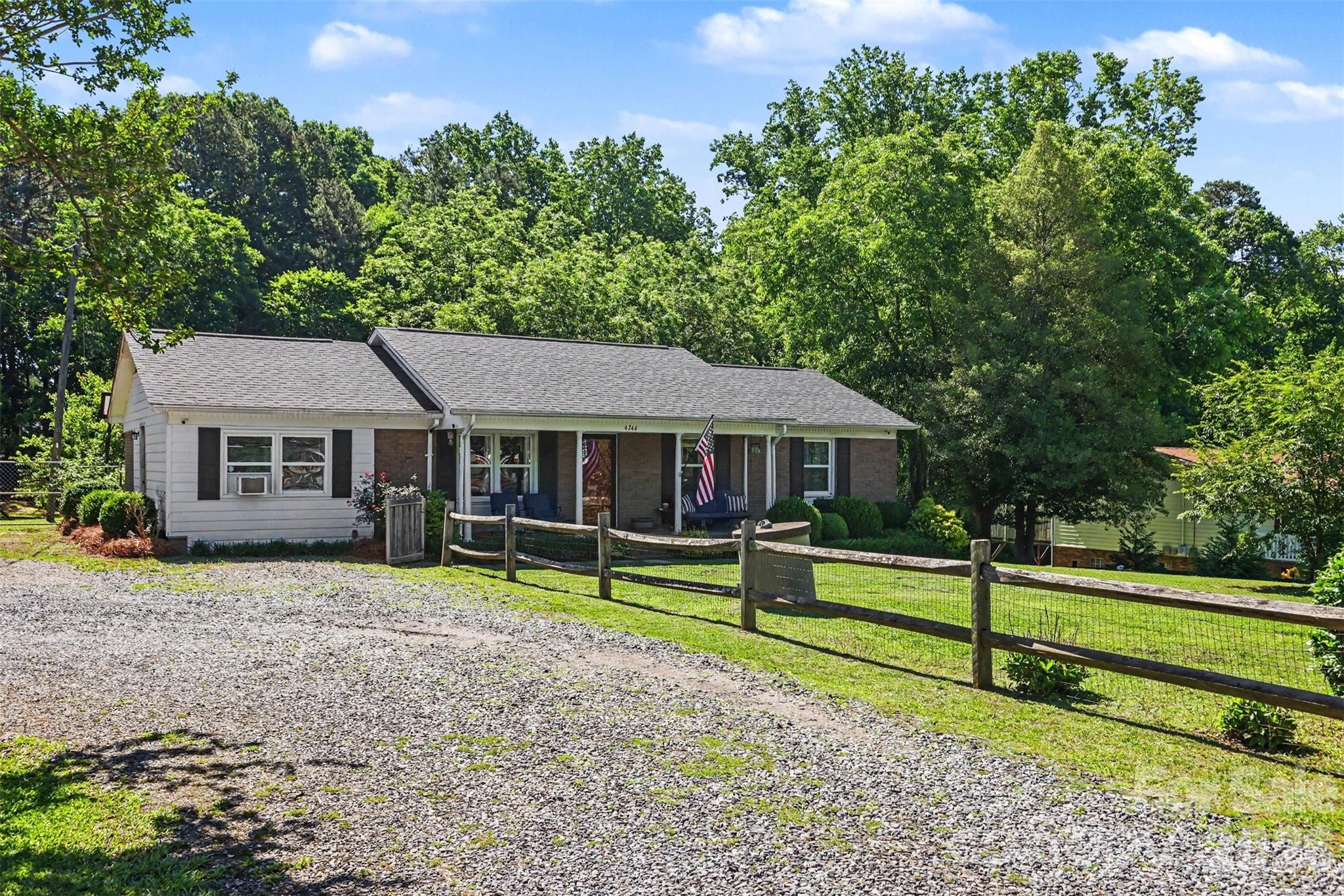 This 4-bedroom, 1.5-bath home sits on over an acre in the Gaston County School District and offers the kind of space that's getting harder to find. Whether you're raising a family or simply want room to spread out, you'll appreciate both the indoor and outdoor living this property provides.
Inside, you'll find a large living room that's perfect for family gatherings, movie nights, and holidays, along with a spacious eat-in kitchen where everyone naturally comes together. Outside, there's plenty to keep the kids entertained, including a commercial-grade playground and their very own playhouse. A storage building provides extra space for tools, lawn equipment, and seasonal items.
One of the biggest surprises is the 1,432-square-foot unfinished basement. Leave it as-is for storage and hobbies, or finish it out to create additional living space. With so much square footage already under roof, the possibilities are endless—and finishing the basement would nearly double the size of the home.
You'll also have peace of mind knowing the major updates have already been taken care of, including a new 2,000-gallon septic system(2026), new HVAC (2018), new roof (2020), and new water heater (2024).
Bonus opportunity: As you drive onto the property, you'll notice a separate building to the left. This structure is owned as an investment by the seller and his father and is available for purchase separately for $100,000. The building already has a new roof, new windows, and has been completely rebuilt structurally. It offers incredible potential for someone looking to create a rental property, guest house, in-law suite, or living space for adult children. Opportunities like this don't come along often and could provide both additional living space and income potential.
This is the kind of property where kids can play outside, families can gather together, and future plans have room to grow. Come see everything this home—and its possibilities—have to offer!