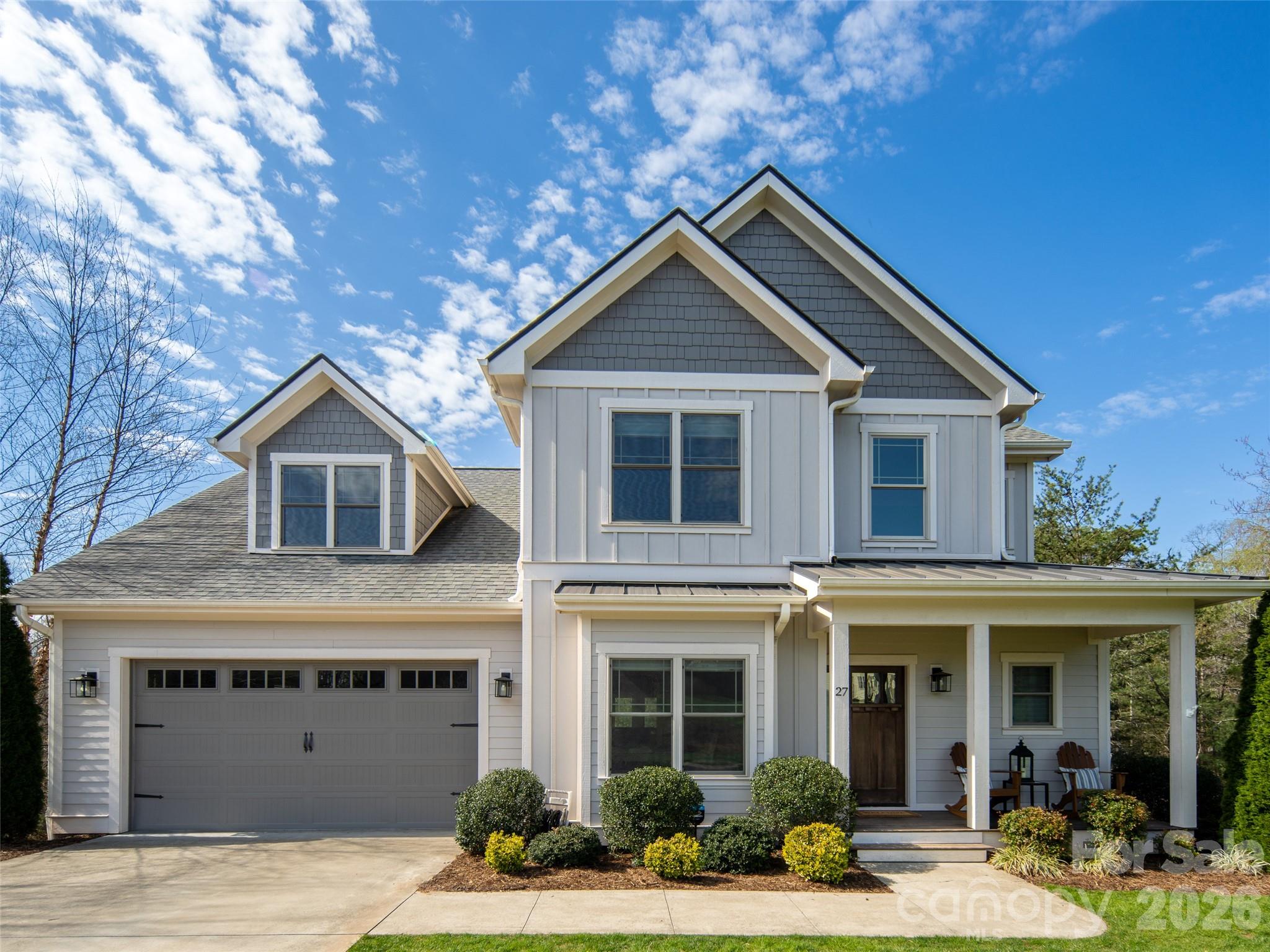Beautifully crafted and meticulously maintained, this stunning 4-bedroom, 3.5-bath home seamlessly blends timeless style with everyday comfort. Nestled in the highly desirable Robinson Creek community, it offers an unbeatable location between Asheville and Hendersonville, just minutes from Whole Foods, restaurants, shopping, entertainment, and all that South Asheville has to offer.

Designed for both comfortable living and effortless entertaining, the open-concept main level features a beautifully appointed kitchen with custom cabinetry, elegant countertops, a spacious pantry, and a large island with bar seating that flows seamlessly into the inviting family room.

The main-level primary suite serves as a private retreat, complete with a generous walk-in closet and a beautifully designed en-suite bath. Just beyond the living area, a spacious screened porch provides the perfect setting to enjoy your morning coffee, unwind in the evening, or entertain family and friends.

Upstairs, you'll find three additional bedrooms, two full bathrooms, and an oversized bonus room offering endless possibilities as a media room, playroom, home office, or fitness space. Ample attic and crawlspace storage provide the practicality today's buyers appreciate.

Combining thoughtful design, exceptional care, and a prime South Asheville location, this home is truly one you won't want to miss.