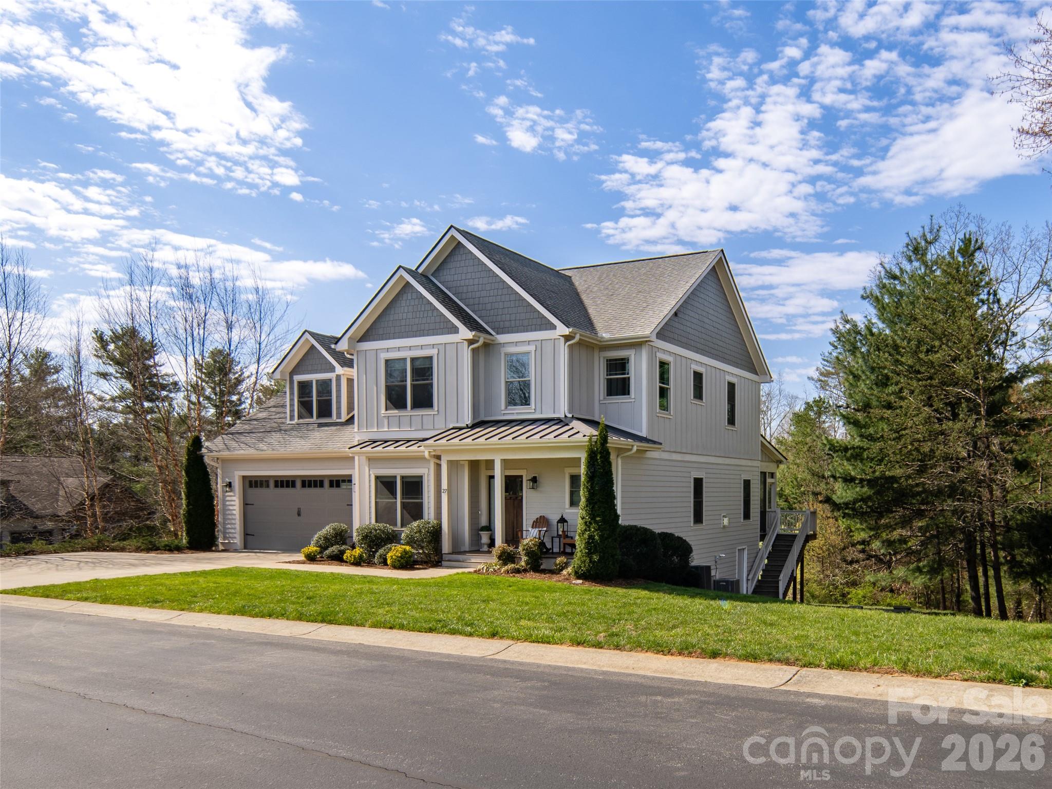 This beautifully crafted and meticulously maintained 4-bedroom, 3.5-bath home blends timeless style with everyday comfort! Located in desirable Robinson Creek, perfectly positioned between Asheville and Hendersonville, and just minutes from Whole Foods, restaurants, shopping, entertainment, and everything else South Asheville has to offer. The open main level makes both daily living and entertaining effortless. The stunning kitchen offers beautiful cabinetry and countertops, a pantry, a large island with seating, and flows beautifully into the spacious family room! The main-level primary suite provides a peaceful retreat with a walk-in closet and elegant bathroom. A large screened porch out back creates the perfect spot to relax or gather with guests. Upstairs, you’ll find three additional bedrooms, two full baths, and an oversized bonus room ideal for recreation or remote work. Extra storage in the attic and crawlspace adds even more practicality to this inviting home.