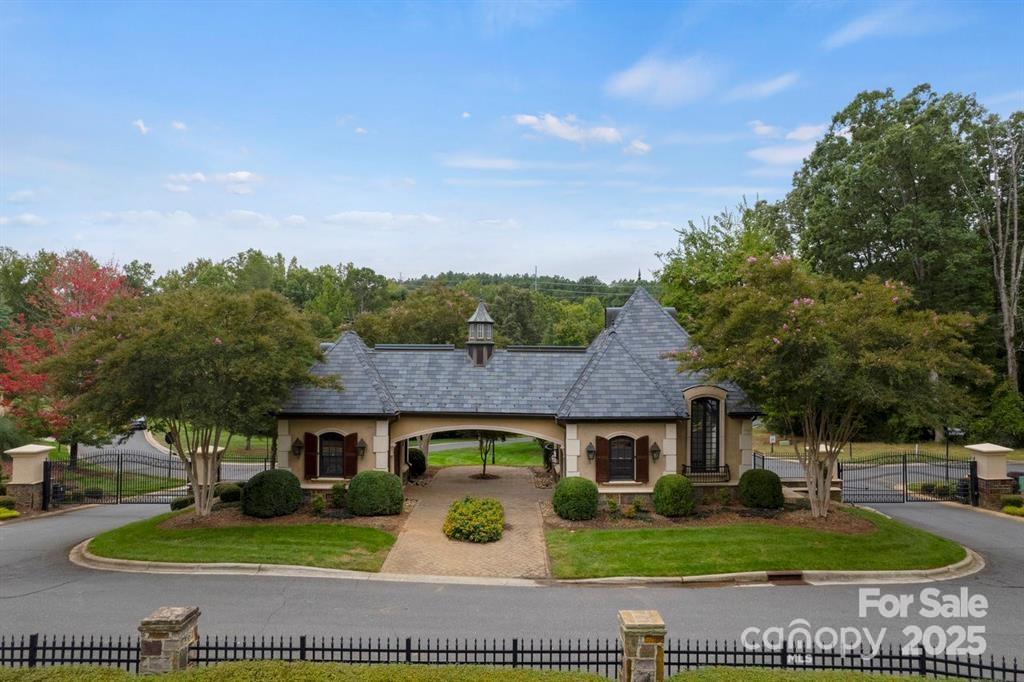 Prime piece of land located in the highly sought-after Reflection Pointe community. This RARE 0.48-acre FLAT lot is the only flat lot currently listed in Reflection Pointe. Build your custom home in a picturesque setting, surrounded by nature & community amenities. Perfectly suited for a 4,000 square foot home, options for a side-load garage or a porte cochere. Floor plan options are available, making it simple for you to visualize and create your home. Luxurious GATED community w/ clubhouse, swimming pool, tennis courts, lake access, walking trails. Residents also have access to a marina area, community beach, & scenic views of Lake Wylie. Nestled in a tranquil cul-de-sac, this lot provides a peaceful retreat while being conveniently located near shopping, dining, and recreational activities. This lot is perfect for those looking to create a personalized living space in a vibrant community. Whether you envision a cozy family home or a luxurious retreat, the possibilities are endless.