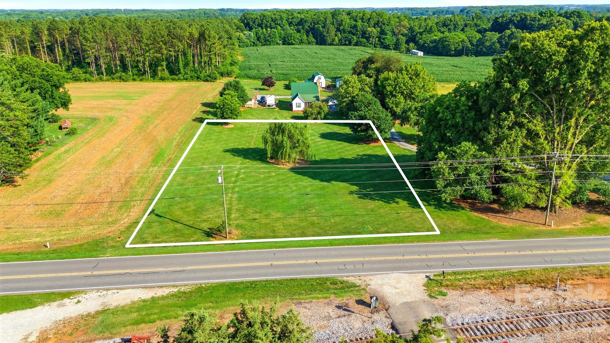 Opportunity to own a cleared 0.92-acre lot in  Mt. Ulla. Build your custom home and enjoy a peaceful country setting with convenient access to Salisbury, Mooresville, and Lake Norman. Level homesite with road frontage and plenty of room for a home, garage, workshop, or outdoor living space. Buyer to verify utilities, septic suitability, and building requirements.