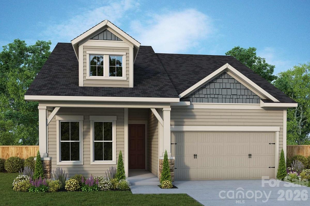 Discover comfortable, low-maintenance living in this beautifully designed home.  Thoughtfully crafted with upscale finishes and modern conveniences, this home offers a relaxed lifestyle just minutes from Waxhaw and Charlotte destinations.  The open-concept floor plan is ideal for everyday living and entertaining, featuring tile and luxury vinyl plank flooring throughout the first floor for a cohesive and durable design. The well-appointed kitchen includes quartz countertops,  gas cooktop and wall oven, and opens seamlessly to the main living area with a cozy fireplace, creating a warm and inviting space.  The private Primary Suite offers a spa-like bathroom with quartz countertops and a spacious walk-in closet. French doors are the finishing touch for your first-floor study.    Guests will appreciate the comfort and independence of a second-floor bedroom, full bathroom and bonus area.  Unfinished storage with full height door access is accessible from the second floor!  Enjoy outdoor living on the covered porch, perfect for relaxing year-round.   It is a short walk to where residents enjoy access to resort-style amenities including a clubhouse, pool, pickleball courts, walking trails, and a full calendar of social activities!  This home blends comfort, quality and lifestyle!