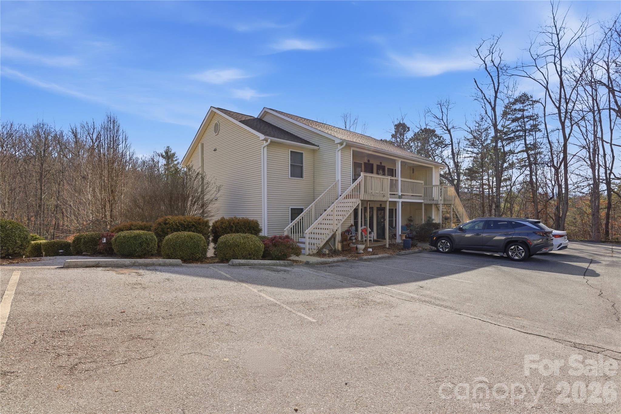 Welcome to peaceful living just minutes from town! This beautifully maintained 2-bedroom, 1-bath condo offers the perfect blend of privacy and convenience in a serene, wooded setting in Candler. Enjoy the feeling of seclusion while being only minutes from shopping, dining, and everyday essentials. Surrounded by mature trees, this home provides a quiet retreat with a covered patio/porch — ideal for relaxing mornings or unwinding in the evening. Inside, you’ll find fresh paint throughout, new flooring, updated appliances, and updated windows, giving the home an updated yet warm and inviting feel. Meticulously cared for and move-in ready, this condo feels both cozy and modern. The community does not allow short-term rentals, creating a peaceful, full-time residential atmosphere.
Whether you're looking for a comfortable place to call home or a smart investment opportunity for long-term rental income, this property offers flexibility and value in a highly desirable location. Enjoy being just minutes from town while still feeling tucked away in your own private retreat.
