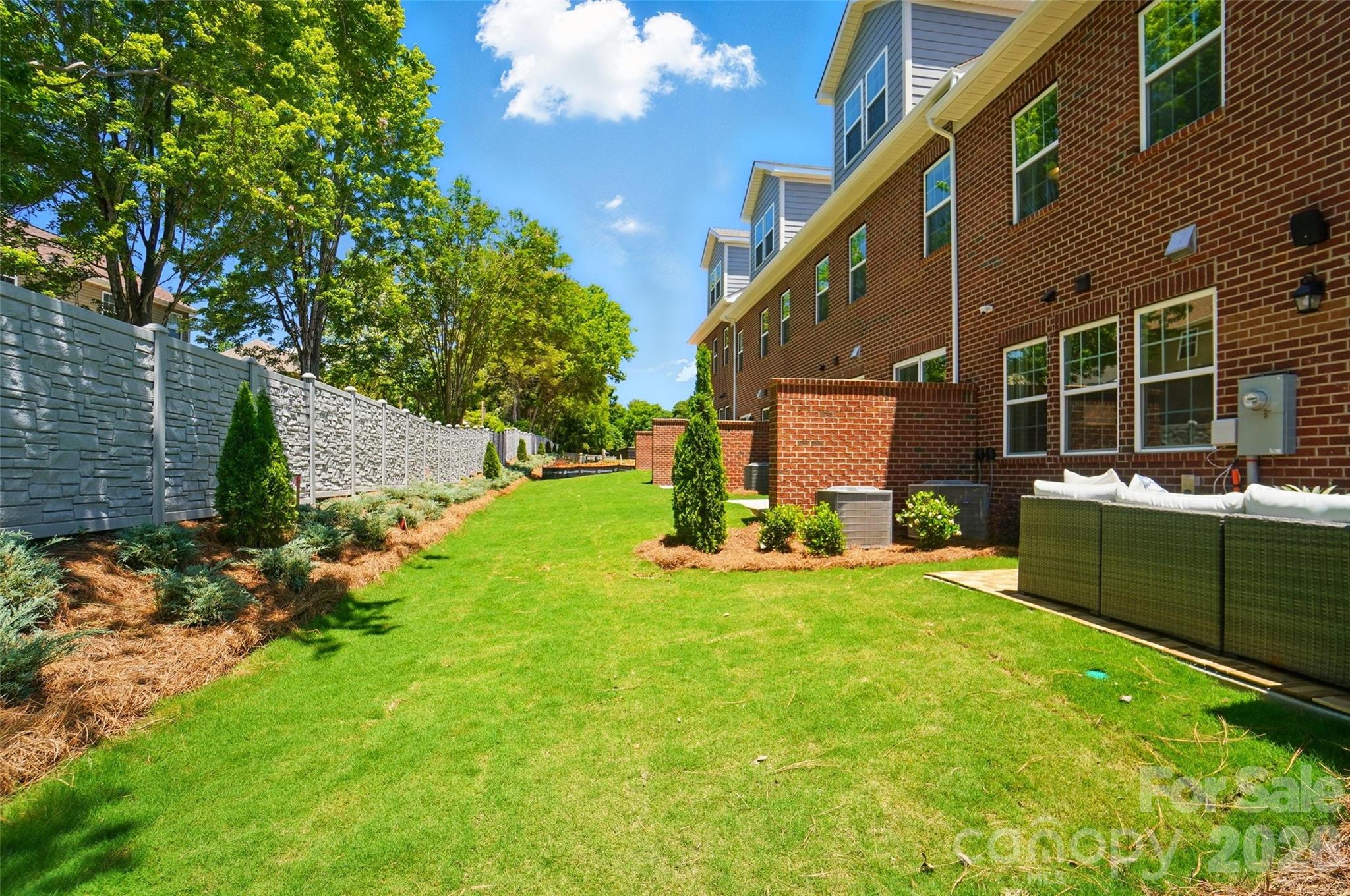 New Luxury Brick townhome in prime Ballantyne residential location!  The Caswell floor plan is spacious, functional and well appointed. Upon entering, you notice elegant features in the foyer including a Tray Ceiling and ext. Millwork. The large open living area features wide plank flooring, a Gourmet Kitchen with huge island, Kitchen dAid appliances, 42" White cabinets w/soft close, pull out shelves,
under cab. lights, Farmhouse sink, and Quartz.  4 bed/3.5 bath including 2 Lg. Primary Suites w/ sitting areas, en suite baths w/ tiled shower, and 2 walk in closets in 2nd floor Primary!  The home is filled with light from an abundance of recessed lights and beautiful trimmed windows.  9 ft. ceilings, 8' doors on 1st and 2nd level, Crown Molding and 2" faux wood blinds throughout the home are a few of the upgrades that enhance this home.

Only 6 homes remain in this exclusive boutique community of 28 townhomes!
Price includes all upgrades and homesite premium.