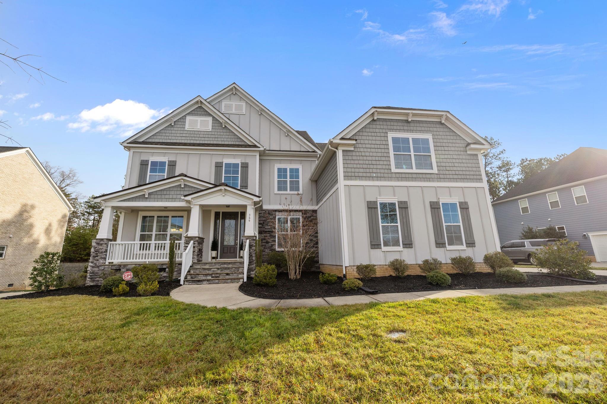 Experience exceptional living in this beautifully appointed 5-bedroom, 5-bath home located in the highly desirable Habersham community. From the charming front porch-perfect for relaxing with a morning coffee or evening conversation-to the impressive two-story foyer, this home combines timeless elegance with everyday functionality. The main level showcases an open-concept design featuring a spacious family room with built-in shelving and a gas fireplace, and a chef-inspired kitchen complete with a large quartz island, gas cooktop, double wall ovens, abundant cabinetry, and generous prep space. A formal dining room offers the perfect setting for special occasions, while the casual dining area overlooks the backyard and provides direct access to the deck, ideal for effortless indoor-outdoor entertaining. A private guest suite on the main floor includes a spacious bedroom and full bath, making it an excellent option for visitors, multigenerational living, or a quiet home office. A convenient drop zone off the garage adds practical organization to daily life.The upper level offers spacious accommodations and versatile living areas, including two secondary bedrooms connected by a Jack-and-Jill bath and another bedroom featuring its own private en-suite bath. The luxurious primary suite serves as a peaceful retreat with direct access to a private second-story deck, perfect for enjoying quiet mornings or winding down at the end of the day. The primary bath is designed for relaxation with a soaking tub, walk-in shower, and generous space throughout. A large bonus room provides endless possibilities for recreation, fitness, media, or play, while oversized closets offer exceptional storage throughout the home.Residents of Habersham enjoy outstanding community amenities including a clubhouse, resort-style pool, scenic walking trails, sidewalks, streetlights, and a peaceful pond with a fishing dock. Conveniently situated near I-77, shopping, dining, and award-winning schools, this exceptional home offers easy access to Charlotte while delivering the perfect blend of comfort, convenience, and community.