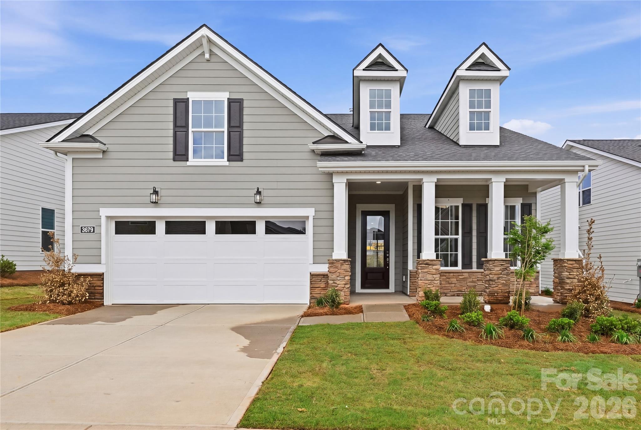 Designer-Appointed and Move-In Ready in The Pines at Sugar Creek on homesite #179! Experience the ease of luxury living in this beautifully upgraded Westview home, thoughtfully designed for both comfort and entertaining. From the moment you enter, you'll appreciate the open-concept layout, elegant finishes, and designer-selected details throughout.

At the heart of the home, the gourmet kitchen impresses with an oversized center island, premium finishes, abundant cabinetry, and a convenient butler's pantry—creating the perfect space for everything from casual mornings to hosting family and friends. The spacious great room seamlessly connects to the covered patio, offering effortless indoor-outdoor living and an inviting setting for relaxing or entertaining.

The private primary suite serves as a tranquil retreat, featuring a generous walk-in closet and a spa-inspired bath designed with luxury and convenience in mind. Flexible living spaces provide endless possibilities for a home office, hobby room, fitness area, or guest accommodations, allowing the home to adapt to your lifestyle.

Located in The Pines at Sugar Creek, one of the Charlotte area's premier active-adult communities, residents can immediately enjoy the newly opened resort-style amenity center, featuring a clubhouse, fitness center, pool, outdoor spa, pickleball courts, tennis courts, bocce courts, and a vibrant social calendar. Combining designer finishes, modern construction, and an exceptional lifestyle, this move-in ready home offers a rare opportunity to enjoy the very best of 55+ living.