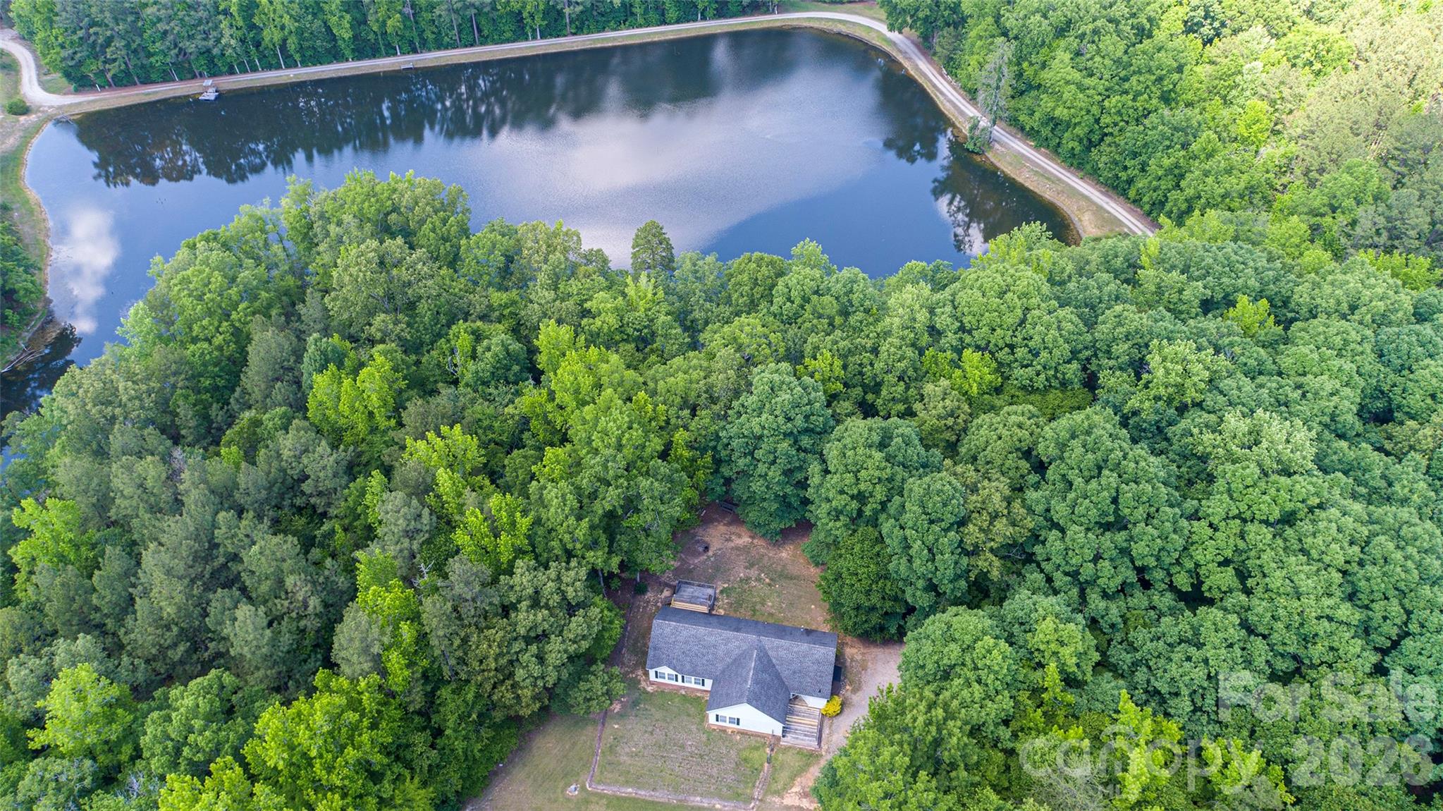 Welcome to this private secluded retreat outside the small town of Kershaw.  This home offers lots of room with almost 2200SF.  Plenty of space to spread out on over 3.5 acres of beautiful hardwoods. 
Open concept is inviting, spacious and offers plenty of room for entertaining! Kitchen is equipped with Stainless Appliances including an LG refrigerator, stove, microwave, and Whirlpool dishwasher. You will find an abundance of cabinets and storage for all your cooking needs. 
Fiber Optic cable and natural gas are nice perks to have while being tucked away in such a rural setting.  
Home sits back off of the road and is not visible upon entering the driveway.  A portion of the driveway is shared with the neighbor to the left and also has a deeded easement. Nice view of the pond from the rear of home and back deck. Property Line borders the pond.
Don't wait, schedule your showing today! 
Seller has already made minor repairs prior to listing.  Seller also had the property surveyed in May 2026. Title work has been completed for both parcels by Trimnal & Myers in May 2026 so closing should be scheduled with them to avoid additional costs for new title work.
Please provide pre-approval letter/proof of funds with your offer.