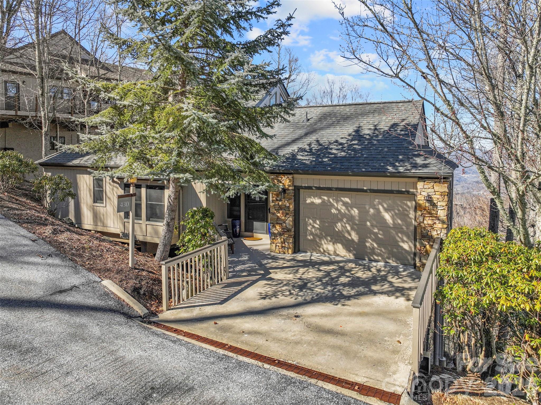 This magnificently updated home in the sought-after Boulder Pass neighborhood at MOUNTAIN AIR offers the perfect blend of rustic charm and modern comfort. From the moment you step inside, you're greeted by stunning long-range mountain views, vaulted ceilings, and an open living area filled with natural light from expansive windows. The great room features a beautiful stone fireplace with custom built-ins, creating a warm and inviting atmosphere. The newly renovated kitchen features brand-new appliances, custom cabinetry, and stylish finishes. The spacious, main-level primary suite includes a newly added sitting area, creating a private retreat where you can relax and unwind in the evening or enjoy mornings with your coffee. Recent updates throughout the home include new carpet, refinished hardwood floors, updated bathroom fixtures, new HVAC and plumbing, as well as a new roof. Outside, an expansive deck invites you to unwind in the cool mountain air while enjoying breathtaking sunsets and sweeping valley views. Conveniently located close to all club amenities and activities, available with separate club membership. The seller will pay for the buyers' full golf membership initiation fee ($95,000) to the club at closing with a full-price offer! Whether you're seeking a full-time residence or a mountain getaway, this exceptional property lets you experience mountain living at its absolute best.