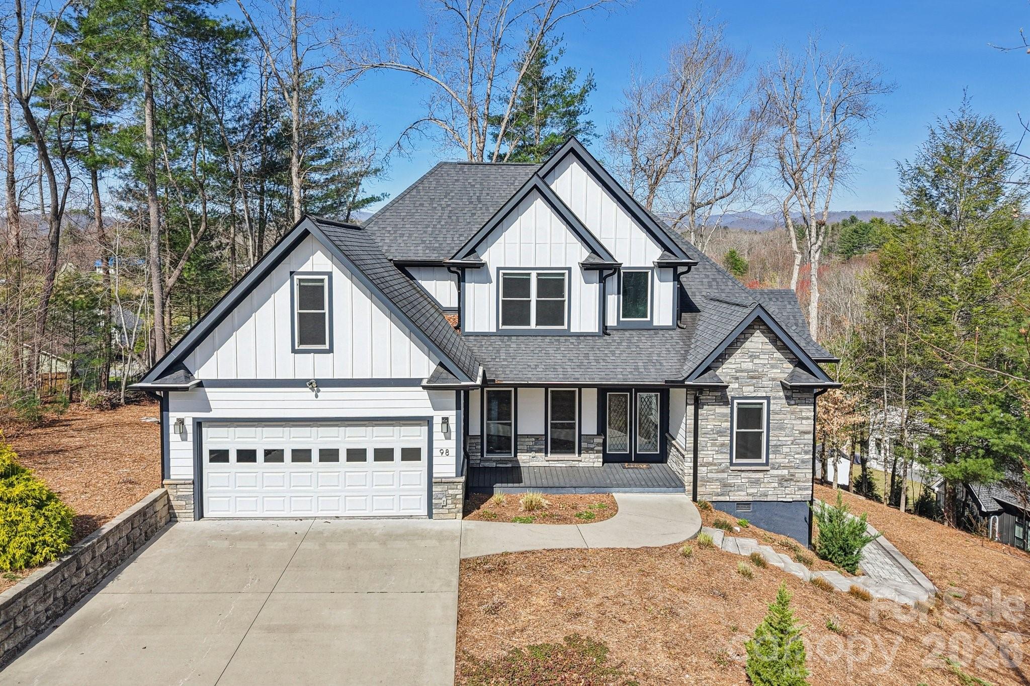 Custom 2019 built home in Etowah! Light, bright & open floor plan, living room w/soaring ceiling & gas fireplace. Kitchen offers glass tile back splash, farmers sink, upgraded appliances, breakfast bar, dining area & formal dining room. Main level primary suite w/tray ceiling & luxurious master bath. Wood & tile flooring & matching quartz counter tops throughout. Two bedrooms, bath & spacious bonus room on upper level. Dual zone HVAC, circulating on demand hot water heater, walk-in insulated crawl space.  Covered front porch, expansive back deck (trex) to enjoy views of western mountains including Mt. Pisgah, extensive landscaping with fire pit.  Small upscale neighborhood ideally located between Brevard & Hendersonville.