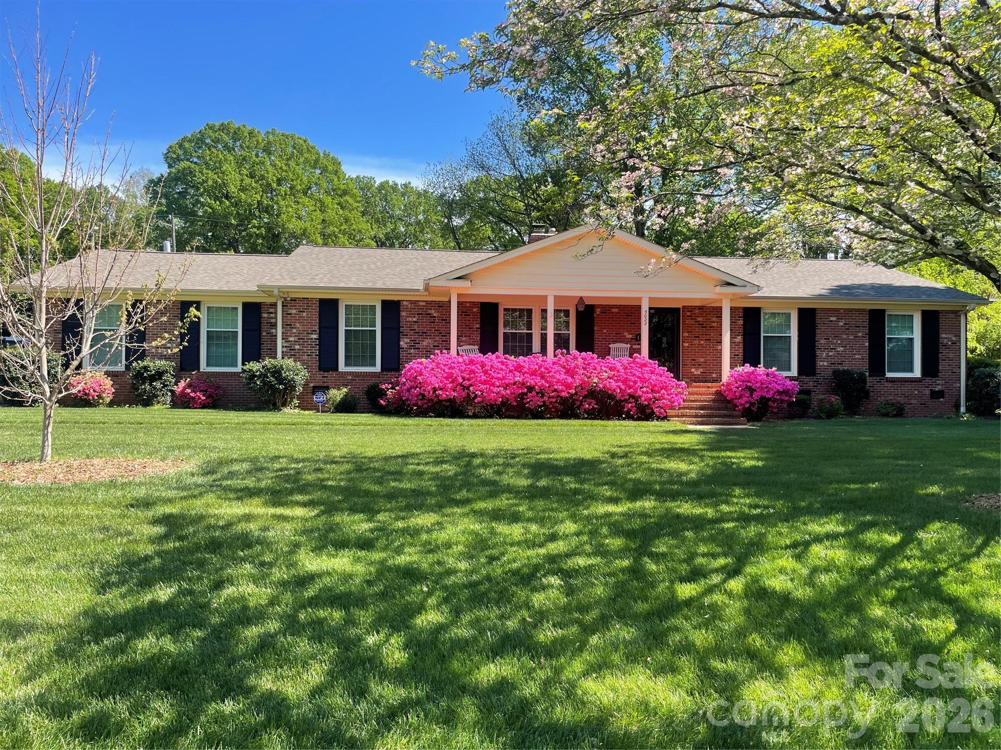 Elegant, traditional full-brick ranch situated on nearly half an acre with a fenced yard. This well-maintained home features professional landscaping and numerous recent updates, including: Roof: Replaced in 2025; HVAC: Replaced in 2021; Stainless Steel Appliances: Installed in 2023; Windows: Replaced in 2020; and Water Heater: Replaced in 2021.  The interior includes a primary bedroom with a white-tiled ensuite bath and a second full bath also featuring white tile. The property has been professionally pre-inspected and is in good condition, making it ready for you to move in and make it your own. Conveniently located just five miles from Uptown Charlotte, the home offers easy access to I-77 and is close to Camp North End. ESTATE: SOLD "AS-IS" with no repairs to be made by the seller.