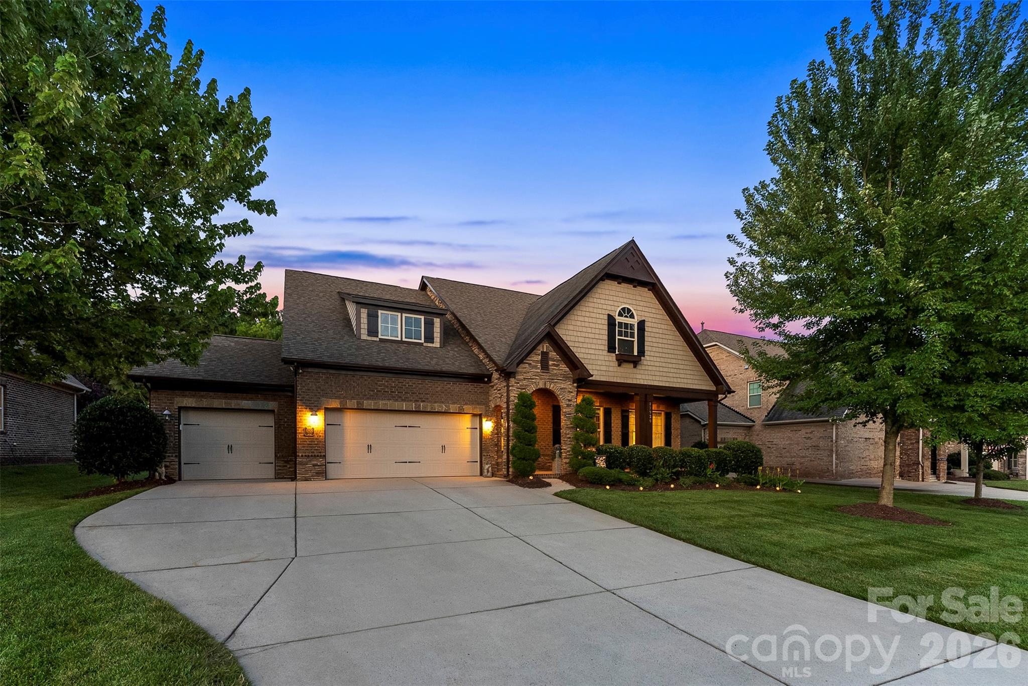 There are neighborhoods people move to...

And then there are neighborhoods people wait for.  Sometimes what makes a home special isn't just the home itself... it's how rarely you ever get the chance to own one like it.

No one story home has been offered for sale in Telfair since 2024. One with a pool, even longer since 2022. In one of Mint Hill's most sought after communities, that's more than a statistic, it's a reflection of a neighborhood people simply don't want to leave.

Nestled within the sought after community of Telfair, this exceptional ranch isn't just another home to hit the market it's one of those rare opportunities buyers hope becomes available but seldom does. Here, quiet tree canopied streets, mature landscaping, and timeless homes have created the kind of neighborhood that simply can't be replicated.

As you turn onto Telfair Meadow, the pace slows. Through traffic disappears. Children ride bikes. Neighbors wave from their front porches. By the time you pull into the oversized driveway, you've already begun to feel what makes this community so special.

Walking beneath the stone accented archway, you're welcomed into a home designed around the moments that matter most. The soaring ceilings, rich architectural details, coffered ceilings, and expansive open living spaces create an effortless flow where conversations continue from the kitchen to the great room, holidays naturally become traditions, and every gathering feels just a little more memorable.

But it's what waits beyond the back door that changes everything.

Open the doors to the all seasons sunroom and you'll find yourself overlooking a backyard that feels more like a private retreat than a neighborhood lot. Towering mature trees create an incredible sense of seclusion, surrounding a custom in ground pool complete with elegant fire and water features, a tanning ledge, and multiple spaces to relax, entertain, or simply enjoy the quiet.

Picture summer evenings with friends gathered around the fire bowls as the pool reflects the sunset. Weekend cookouts where children spend hours swimming while conversations stretch long after dark. Early mornings with coffee in the sunroom, watching the trees sway before the rest of the world has even started its day. It's the kind of space that quietly becomes the backdrop for life's most treasured memories.

Designed for the ease of one story living, every room is exactly where you need it, making daily life feel both effortless and connected. The oversized three car garage with custom epoxy flooring provides space not only for vehicles, but for hobbies, storage, and everything that comes with an active lifestyle.

And while the setting feels wonderfully tucked away, you're only minutes from Mint Hill's shopping, dining, parks, and an easy drive into Uptown Charlotte.

Some homes impress you in photographs.

Others change the way you feel the moment you step through the front door.

In a community as sought after as Telfair, opportunities like this don't come around often. This is a home that deserves to be experienced in person because no photograph can truly capture the feeling of being here.