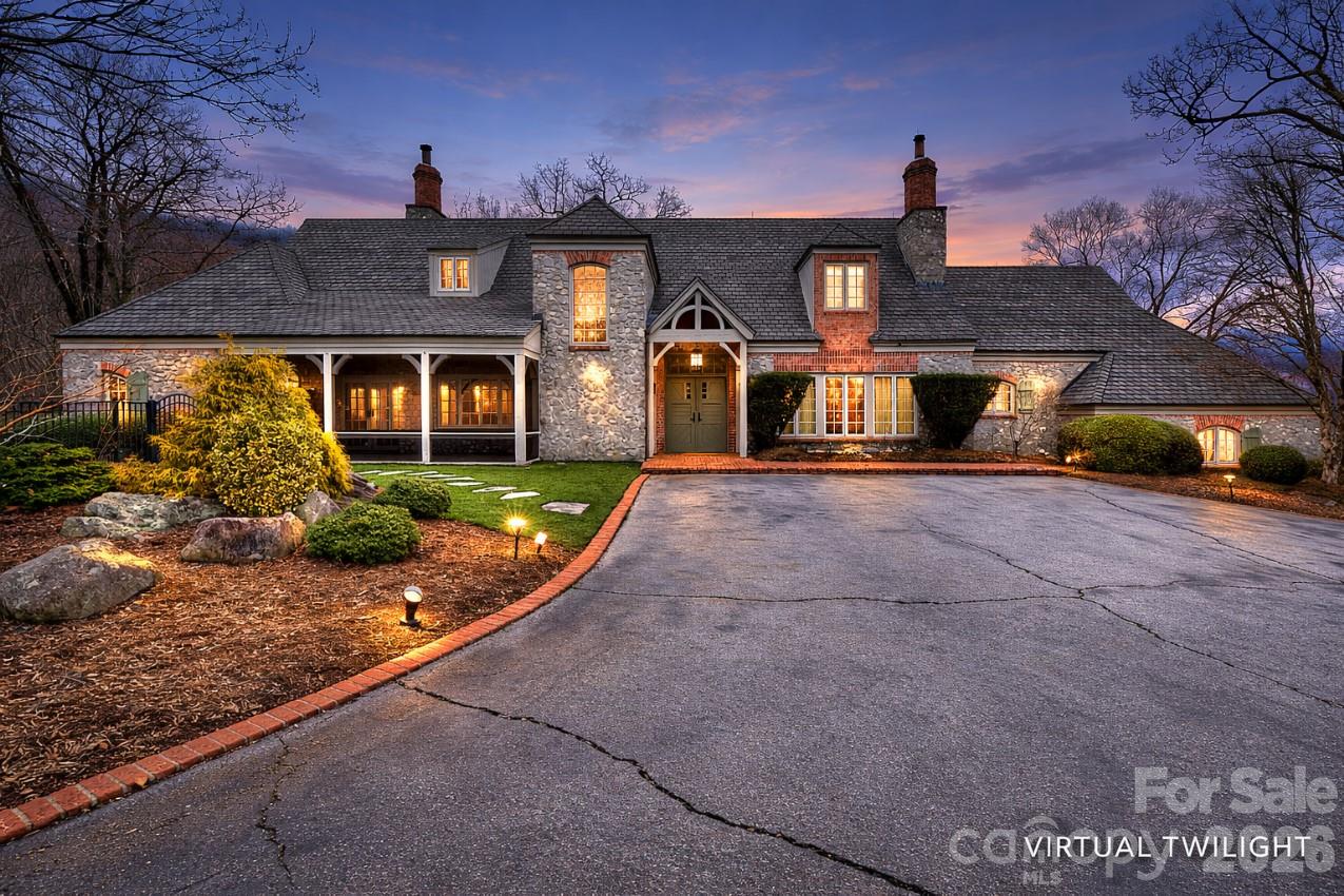 A rare opportunity to experience exceptional privacy, acreage, and breathtaking mountain views within The Cliffs at Glassy! This property is surrounded by approximately 345 acres of natural preserve land in a permanently protected mountain setting. The European inspired estate was thoughtfully designed with refined craftsmanship and built-ins throughout. The home features expansive living spaces that capture the surrounding mountain scenery. The gourmet kitchen is beautifully equipped with a Sub Zero refrigerator, Thermador Professional range, chiseled slab granite, hand painted backsplash, and a walk in pantry. The private Primary retreat offers dual bathrooms, dual walk in closets, and a beautifully designed shared shower offering a true spa-like experience. Additional highlights include a private study, screened in porch and theatre room. The upstairs includes two bedrooms, with built-ins, a shared bathroom, and a cedar lined closet for extra storage. The amazing outdoor space is simply unparalleled. Astroturf provides year round beauty with low maintenance. The IPE deck and additional patio space create a legacy escape for outdoor entertaining. This is an estate sale and includes 3 parcels, which is reflected in the Annual HOA dues.  Experience the beauty, privacy, and elevated lifestyle that define living in The Cliffs at Glassy!