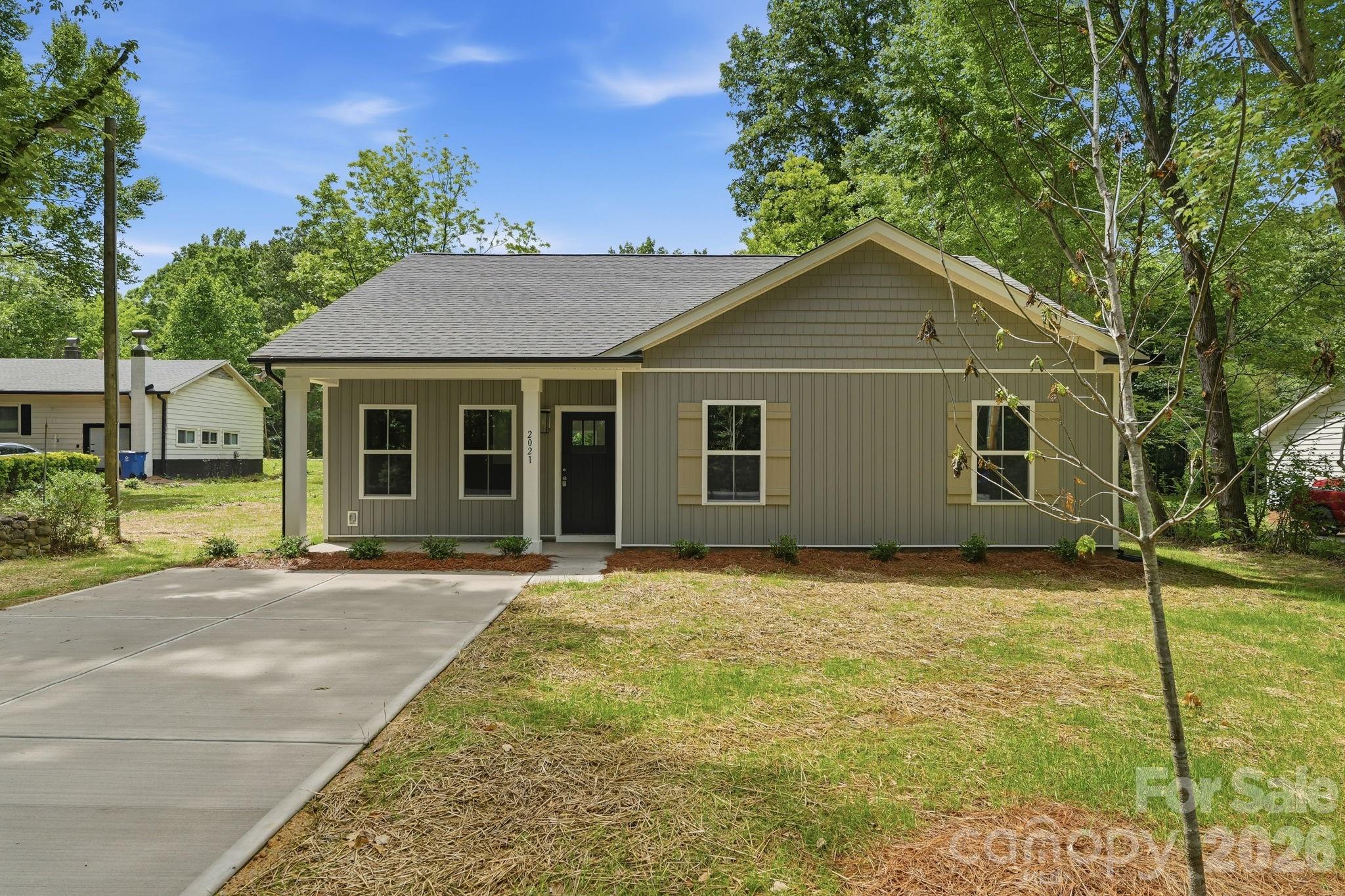 Welcome to 2021 Hart Rd, a beautifully crafted new construction home offering 4 bedrooms, 2 full bathrooms, and easy one-level living on nearly half an acre in Charlotte. This thoughtfully designed home features an open floorplan, modern finishes, spacious bedrooms, and plenty of natural light throughout. The spacious primary suite includes dual vanities and a well-appointed ensuite bathroom. Step outside to enjoy the huge backyard with endless possibilities for entertaining, relaxing, or creating your dream outdoor space.