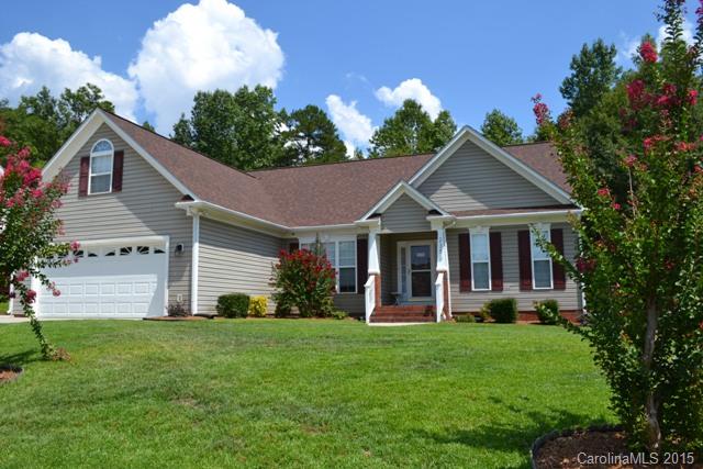 Great outdoor space includes a large deck, patio area, and front porch.  Attached double garage & a detached heated/cooled double garage w/half bath and room above. Home offers a split bedroom plan, formal dining room, great room with fireplace/gas logs.  Sun room, spacious kitchen  has solid surface counter tops, newer dishwasher, microwave and refrigerator.  All living on main level except for bonus room over the garage.  This is an incredible home.