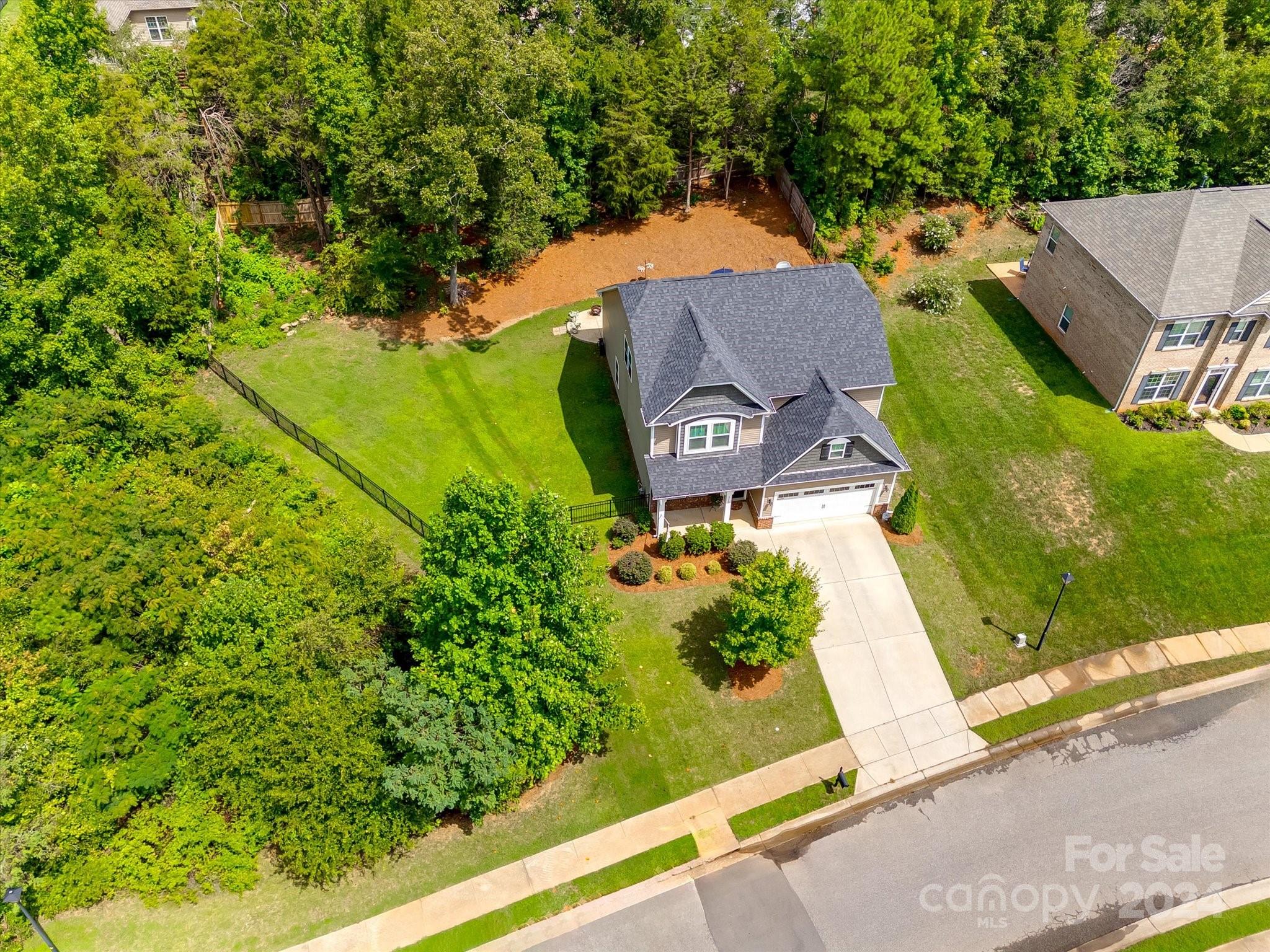 This exquisite 4BR/2.1BA 2-story home is situated on a fenced .39-acre lot with wooded tree-lined buffer. Ample space for outdoor activities & privacy, ideal for both relaxation & recreation! This meticulously maintained home boasts a perfect blend of luxurious features & functional design. Upon entering, you'll notice the grand coffered ceiling in the dining room and gorgeous flooring. The chef's kitchen is a culinary dream, featuring not one, but two islands, perfect for meal preparation & entertaining alike. The primary BR on main provides a tranquil retreat, spacious & sophisticated with a deep garden tub, separate shower & large walk-in closet. The secondary BRs feature vaulted ceilings, enhancing the room's aesthetic appeal. This home is a rare find, blending modern luxury with practical living spaces, you'll be proud to call this one home. Walking distance to the beautiful community pond, cul-de-sac street!