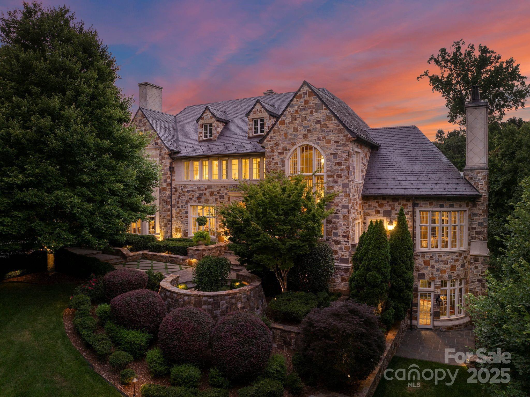 This One of One!  For those who value prestige, ultimate privacy, security, and ultra-luxury, this French Provincial estate in the heart of South Park offers it all!  Neatly nestled within Morrocroft Estates, Charlotte’s most exclusive gated community with 24/7 security, it’s a sanctuary of tranquility, minutes from the city’s best dining and shopping. Your perfect East Coast location in a top 5 fastest growing city in the United States, just 15 minutes from a top international airport (private jet charters), and Uptown Charlotte. This ultra-luxury French estate (at almost 15,000 sqft) embodies timeless elegance and sophistication. Completed in 2008 the home offers 7 Beds and 7.3 Bathrooms, with 12' main-level ceilings, 10' ceilings on the upper level, and 11' ceilings at the walk-out basement level. Designed with bespoke materials and expert craftsmanship, the home features a main-level primary suite, gourmet chef’s kitchen, multiple grand living spaces, executive office, library, wine cellar, home theater, and elevator. Lutron lighting and Waterworks plumbing throughout.  A unique feature the home is the outdoor living, there is either a porch, balcony, patio, or veranda off of every main room in the home. The resort-style backyard boasts a heated saltwater pool, spa, and cabana with an outdoor kitchen, all within a 270 degree green fortress of lush and mature landscaping that offers complete privacy. You can be in the middle or everything while feeling you're in the middle of nowhere. Three-car garage and detached carriage house complete this rare offering. The home is offered fully furnished, custom draperies, and floor coverings. With only finest sourced and imported materials, bespoke finishes, and expert craftsmanship this estate has integrated the essence of a classic French chateaux with architectural grandeur, enduring design, and modern luxuries for contemporary living.