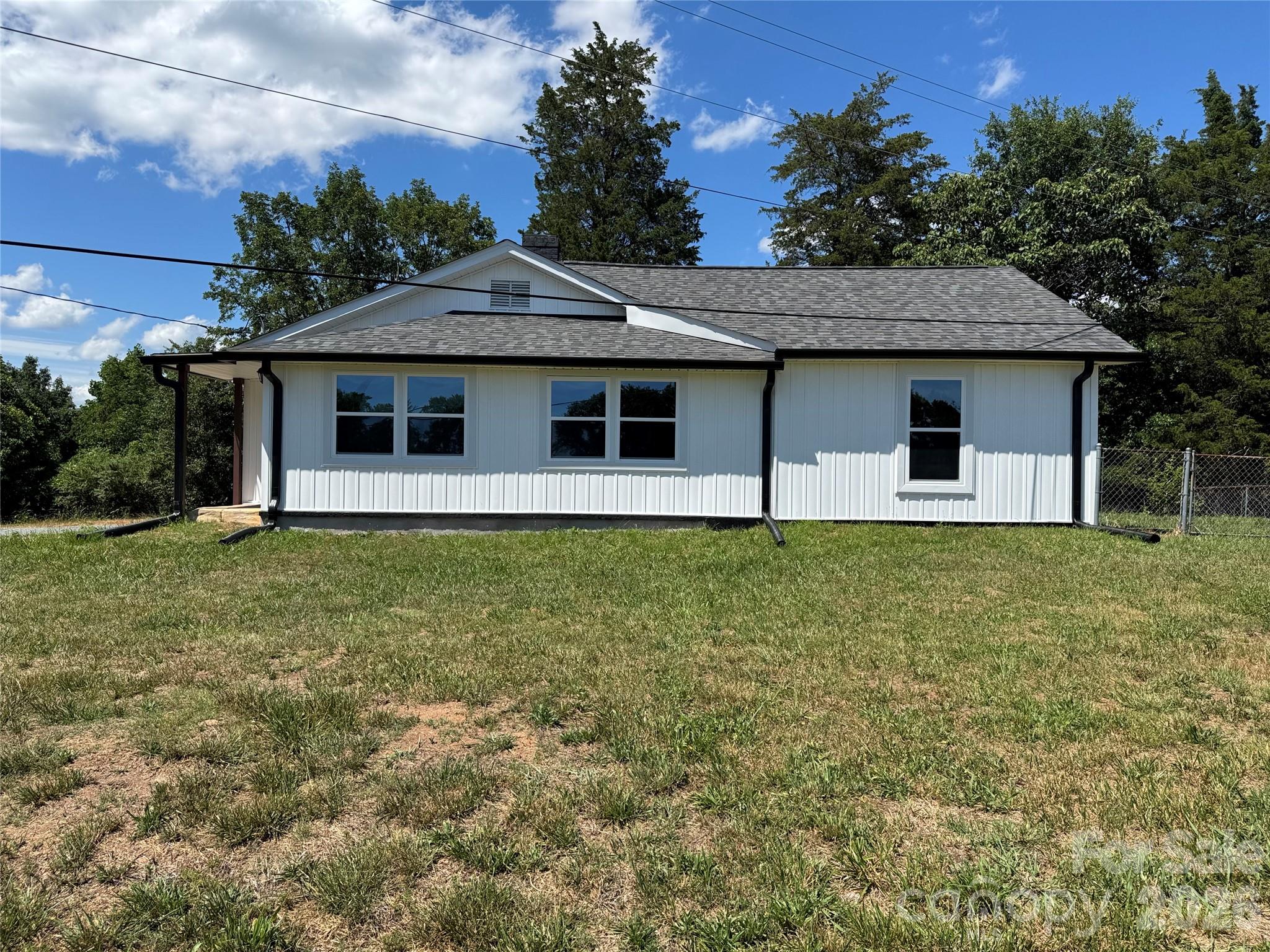 Complete remodel, Move-in-Ready, 3 bedroom,2 bath,1.54 ac.,
All New:architectural shingles, double pane windows, vinyl siding, heat pump, water heater, electrical, plumbing, LVP flooring throughout, light fixtures, stainless steel appliances, kitchen cabinets and quartz countertops. electric fireplace, 
fenced in side yard, 2 bay shed, Cleveland County certificate of occupancy on file