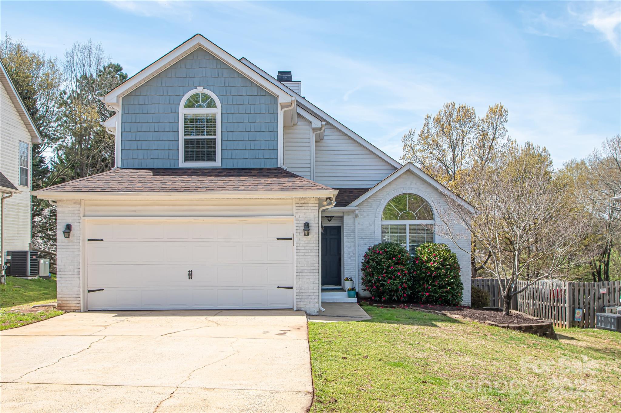 Enjoy wonderful lake living at it's best! Includes EXCLUSIVE OWNERSHIP OF GATED DOCK AND DEEDED BOAT SLIP WITH A 7,500 LB LIFT only 2 years old! Beautifully updated home located in .4 acres and a short walk to  boat slip. Dramatic 2 story entrance leads into a spacious living room and dinning room w/ soaring vaulted ceilings and lots of natural light.  Kitchen was updated with granite countertop, tile backsplash and S/S appliances. Breakfast room and family room are right off the kitchen offering a nice open floor plan perfect for relaxing. Upper level has 4 beds/2baths. Beautiful primary bath updated with a huge walk-in shower, double vanity, walk-in closet. Enjoy the outdoors on an expansive deck perfect for entertaining. Home and deck are freshly painted. New plumbing 2021. NEW carpet and pad 2021. Large, flat, fenced yard w/ storage shed located outside the fenced area but inside the property line. Great location! Near Premium Outlets, restaurant, shopping. Only 10 Min to airport.