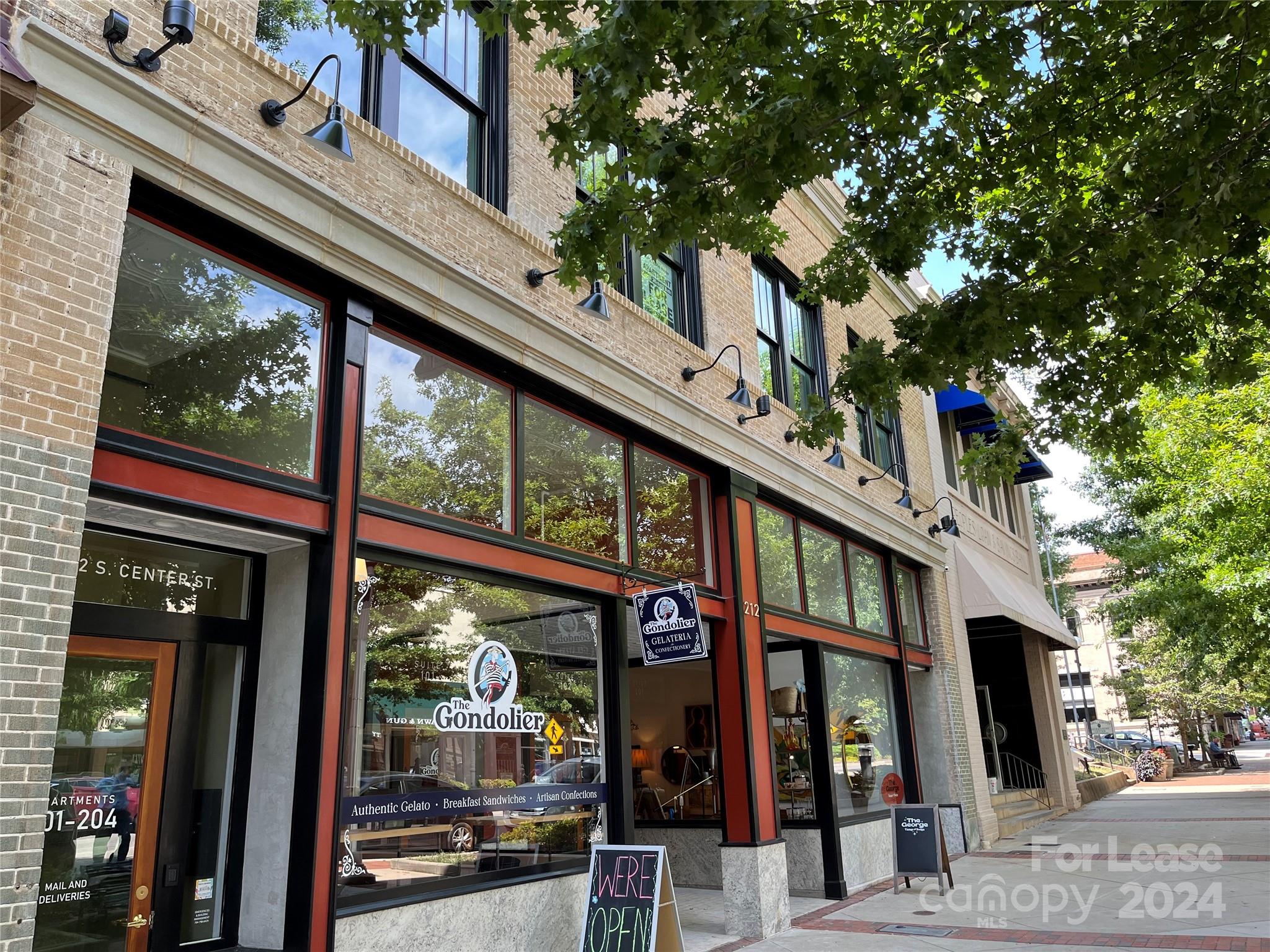 Live in a second floor apartment over a storefront in the fully restored 1922 Historic Jenkins Building in Downtown Statesville. This is an upscale mixed adaptive reuse of a 10,000 sq ft downtown building that features four apartments, two retail spaces and one office. The apartments are on the second floor. 
Apartment includes a complete appliance package with full size stack washer/dryer, range, hood (vented to the outside), dishwasher, and refrigerator. Walls, ceiling, and floors are fully insulated for energy efficiency and sound dampening. State of the art HVAC with exposed ductwork, new electrical, and new plumbing that include instantaneous gas water heaters. The entire building is protected with monitored fire alarm and sprinkler systems. All entry doors have electronic door locks with keypad entries. Common areas are monitored with recording cameras. This is a non-smoking building. Apartment is accessible by stairs from both the rear parking lot and Center Street.