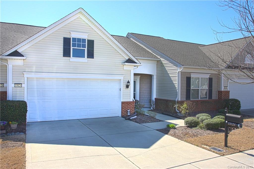 Very nice villa in a great location on dead end street in Sun City Carolina Lakes. This is a very clean home that is "move in condition". Unit has recently been painted and new carpets were installed. You can walk to the shopping center or drive your golf cart. Sun City is a 55+ community. Must see!!

HOA Fee covers roof, siding, Insurance, lawn maintenance and irrigation, fence and gates, common area maintenance, exterior, firewalls, and a full membership to all the facilities including pools and gym. Truly an exterior maintenance free home.