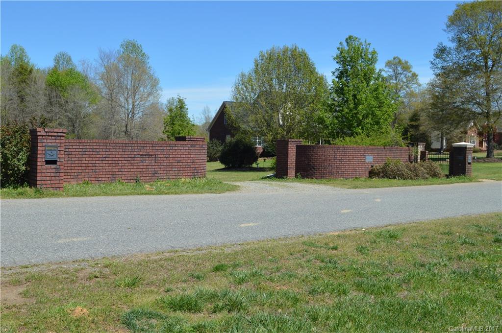 This tract, adjacent to an exclusive subdivision, offers 5.36 acres of beautifully wooded land with a large pond just waiting to become a mini-farm or a stately country retreat. An oasis on it's own, the property is accessed through a deeded right of way in Vanderburg Estates II that is shared with the neighbor. It is fenced, with some sections needing minor repair. This excellent location gives easy access for a commute to Concord, Monroe, and the I485 corridor.