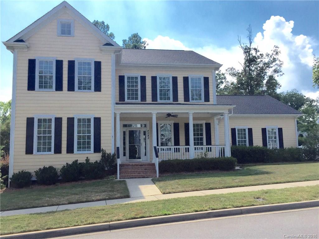 Gorgeous Baxter home within walking distance to pool & playground.  3 car garage, open floor plan with custom light fixtures throughout, newly refinished hardwoods, master on main, large secondary bedrooms, 2 story great room with wainscoting, arched doorways, butlers pantry, tiled screened porch with paver patio, irrigation system, alarm system, natural gas line to grill and 2 laundry rooms! Lg wooded lot that backs up to nature trail. Move in ready!