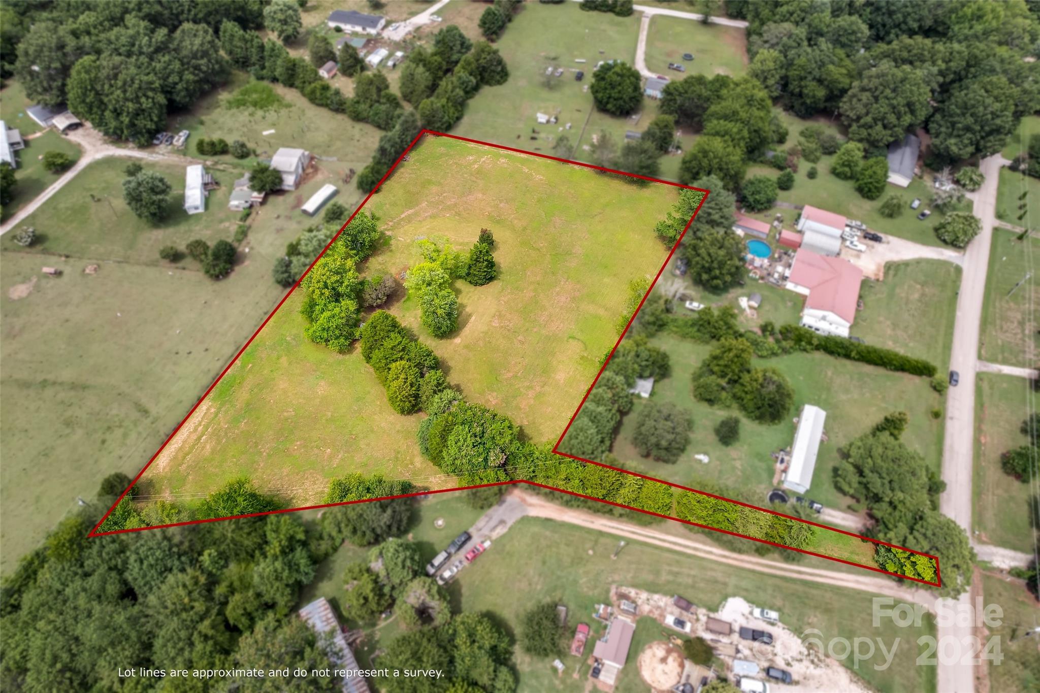 Explore the possibilities with this expansive 2.75-acre parcel of vacant land. Nestled in a serene location of York, SC, this property offers the perfect canvas for your dream home or investment project. Enjoy breathtaking views and ample space for outdoor activities. There is a community well on the property along with a septic tank installed. With easy access to local amenities and the area's natural beauty, this land provides the ideal setting for creating a peaceful retreat. Seize the opportunity to build and design your future in this tranquil environment. Don't miss out on this rare opportunity!