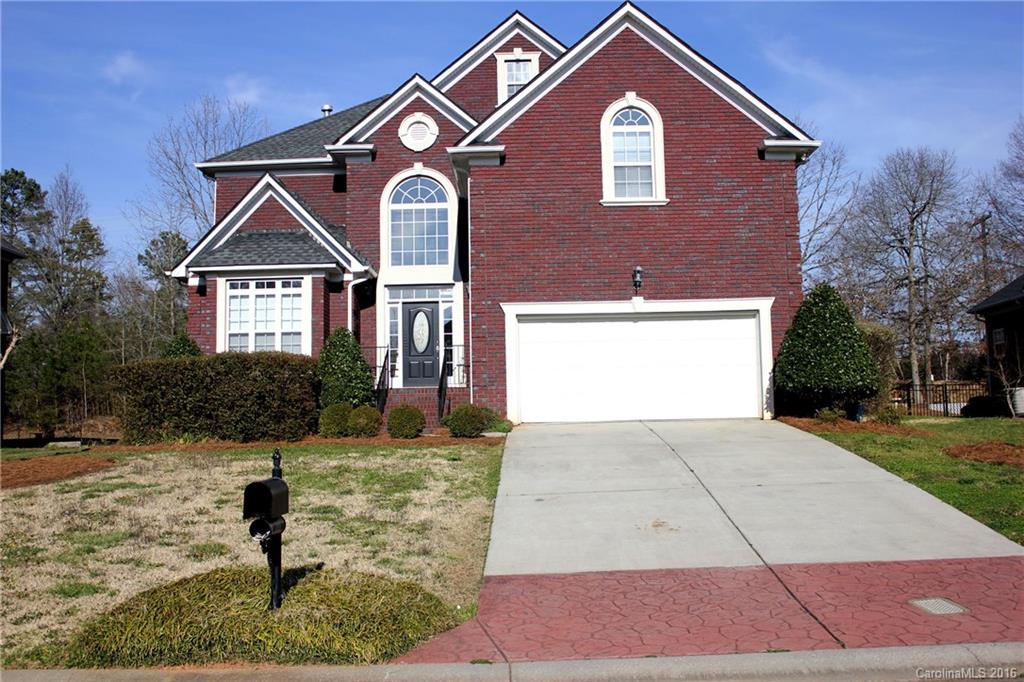 Brick custom home features gorgeous hard wood floors, formal living and dining room. The kitchen has an island, pantry and a breakfast nook. The kitchen opens to the two-story great room, with it's own fireplace upstairs balcony. There is a guest room downstairs and a large laundry room. The beautiful two story foyer features wrought iron railings and crown molding. The luxury master suite has tray ceilings, a fireplace & jetted garden tub. The home is freshly painted with new carpet throughout.
