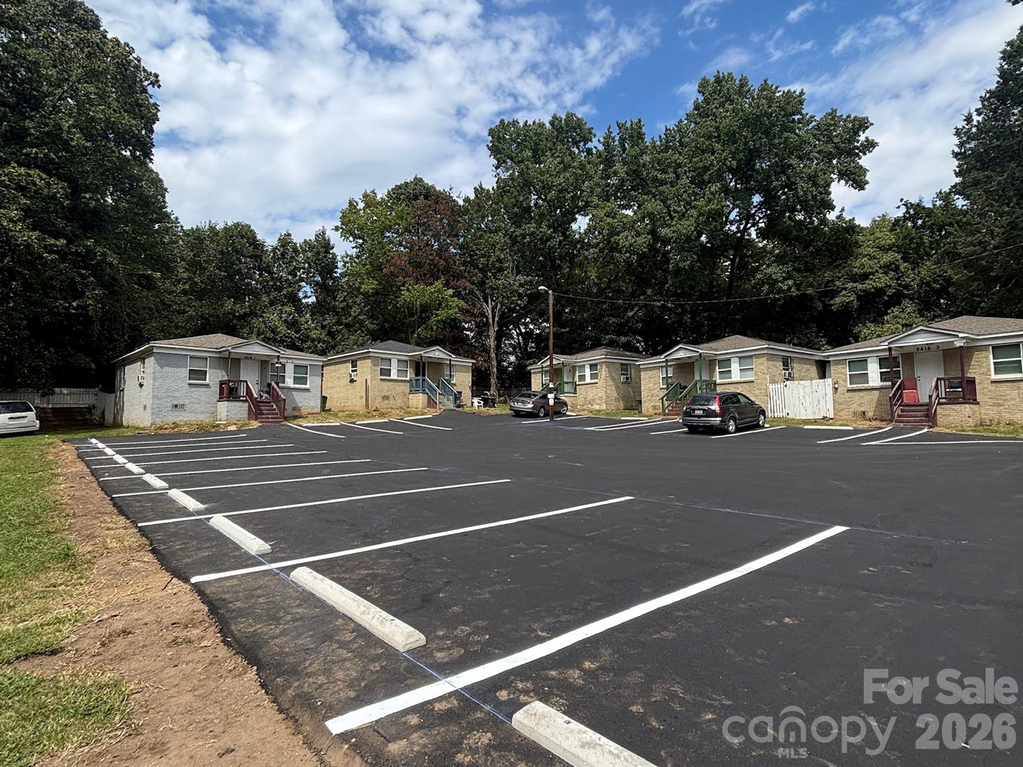2416 Julia presents an opportunity to acquire a 12-unit community comprised entirely of standalone 2BR/1BA homes, offering tenants the privacy and feel of single-family living. All utilities are individually metered. The property presents a compelling value-add opportunity through renovation and lease-up, with eight units currently occupied and the remaining units offering immediate upside through vacancy and turnover. Baseboard heat and window A/C keep maintenance straightforward