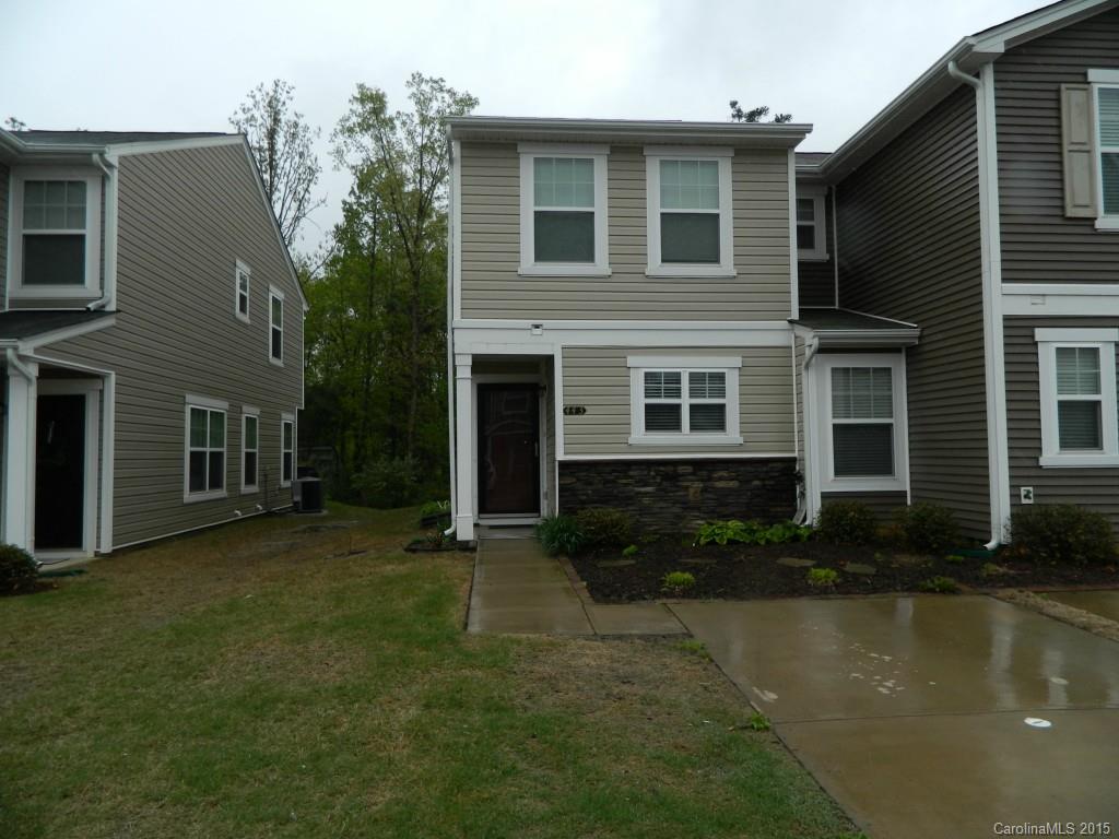 Wonderful end unit, spotless and ready to move in! Open floor plan with spacious great room. Brand new neutral carpet. Kitchen has upgraded cherry cabinets and laminate countertops. Enclosed patio with fence backs up to woods and walking trails, and the unit is right across from the pool. Great deal in Fort Mill School District!