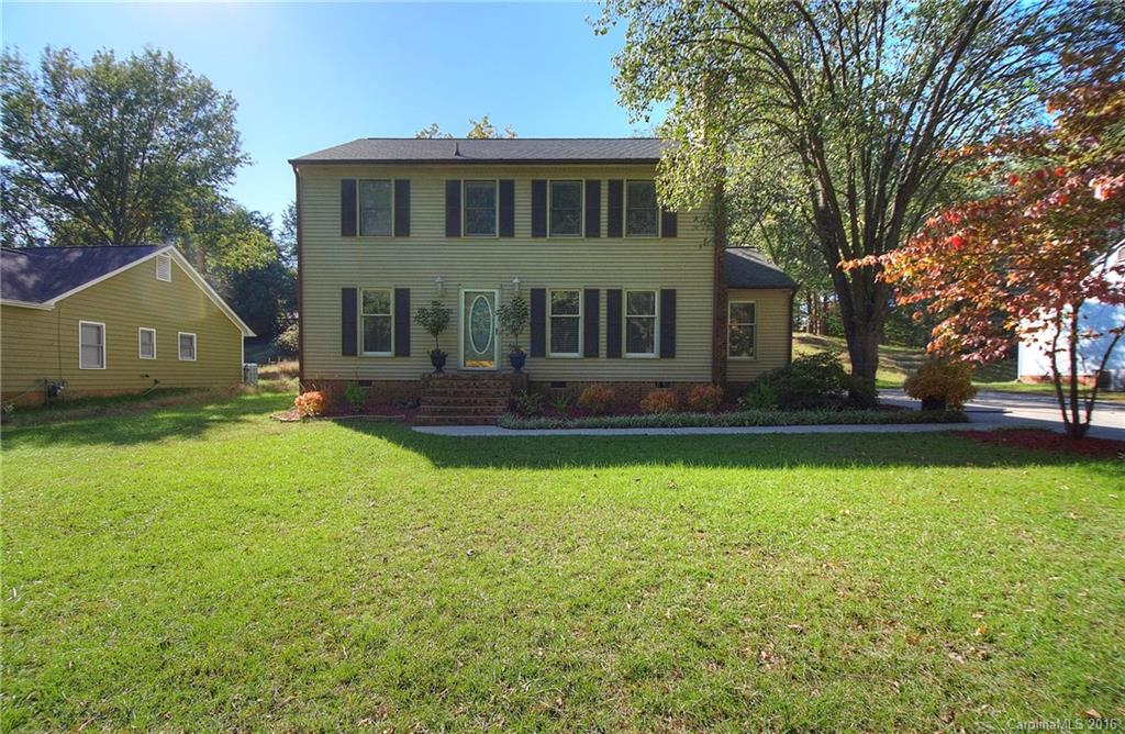 Nestled in a cozy tree lined neighborhood just two minutes from the heart of prestigious Ballantyne, this beautiful four bedroom home features new hardwood floors, new carpet, new stainless steel appliances and a huge lot with fire pit and 16x16 deck. Location is everything in Charlotte.  If you see this home you will want it.