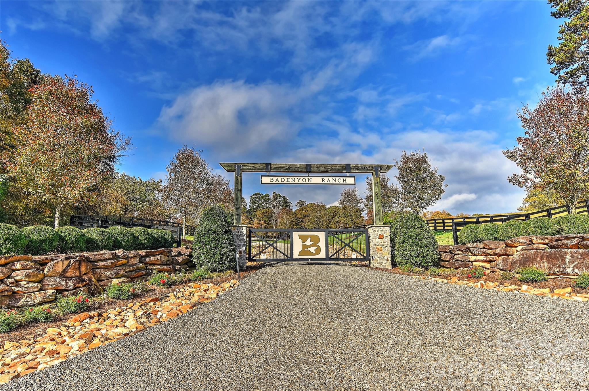 Badenyon Ranch - Perfectly planned Family Farm & Sportsman's Paradise on 652+ acres w/ eye catching gated entrance. Primarily sold w/ furnishings & farm equipment included! Property features main lodge & caretaker's quarters, 2 guest cottages, garden prep house w/ commercial freezer, cooler, ice maker. Fenced garden w/ berry & grape production, 3 farm equipment storage buildings, 15 dog kennel building, care room & 7 acre fenced dog exercise area. 3 stocked fishing ponds w/ trout & catfish, honey production, within Yadkin Valley AVA (wine growing region) & Hunt Preserve Permit. Property managed for trophy deer & early release quail for 25 years. Underground power & fiber optic internet service to lodge/cottages. Hunting Creek runs along north boundary of property w/ miles of ATV trails. Lodge & cottages feature high end finishes including stone, western red cedar & gorgeous wood bark siding. Quail Cottage features basement w/ bonus space. All residences supported by back-up generators. Extensive heavy equipment including skid steer, bulldozer, excavator current model John Deere. 2 grain silos & ATV's. Property allows for endless possibilities and an Additional 106 acre parcel (4834-64-6030.000) available for sale that would increase total acreage to 758+ acres.