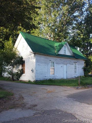House is in very poor condition, does have a newer metal roof. Two rooms on main level and upstairs is two bedrooms. Value is in land only.