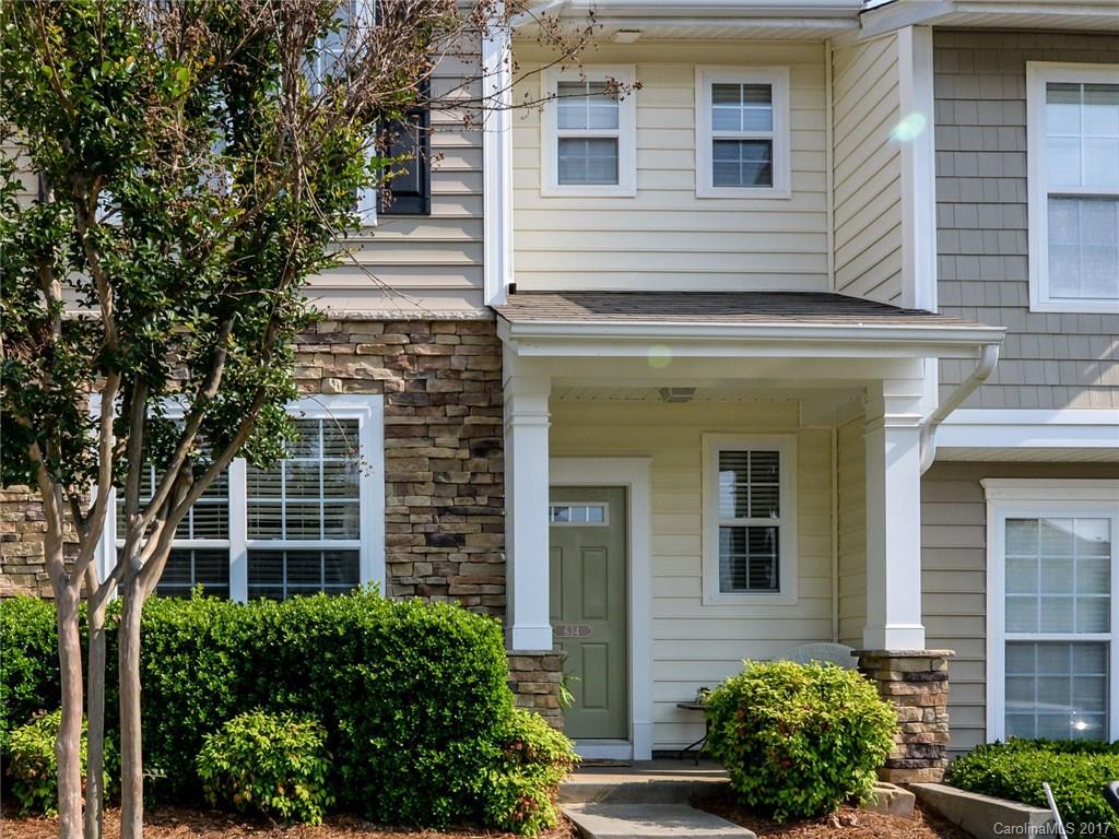 Location, location, location!! You get an open floor plan with this 3BR, 2.5 BA townhome in the award winning Fort Mill school district. Kitchen opens to the great room, that boasts a gas log fire place. Front room could double as a formal dining room or office area. Enclosed patio with storage room off of the great room. 3BR upstairs. Master BR has vaulted ceiling with w/i closet, and dual vanity in master BA. Enjoy the awesome community pool and other great features of this neighborhood!