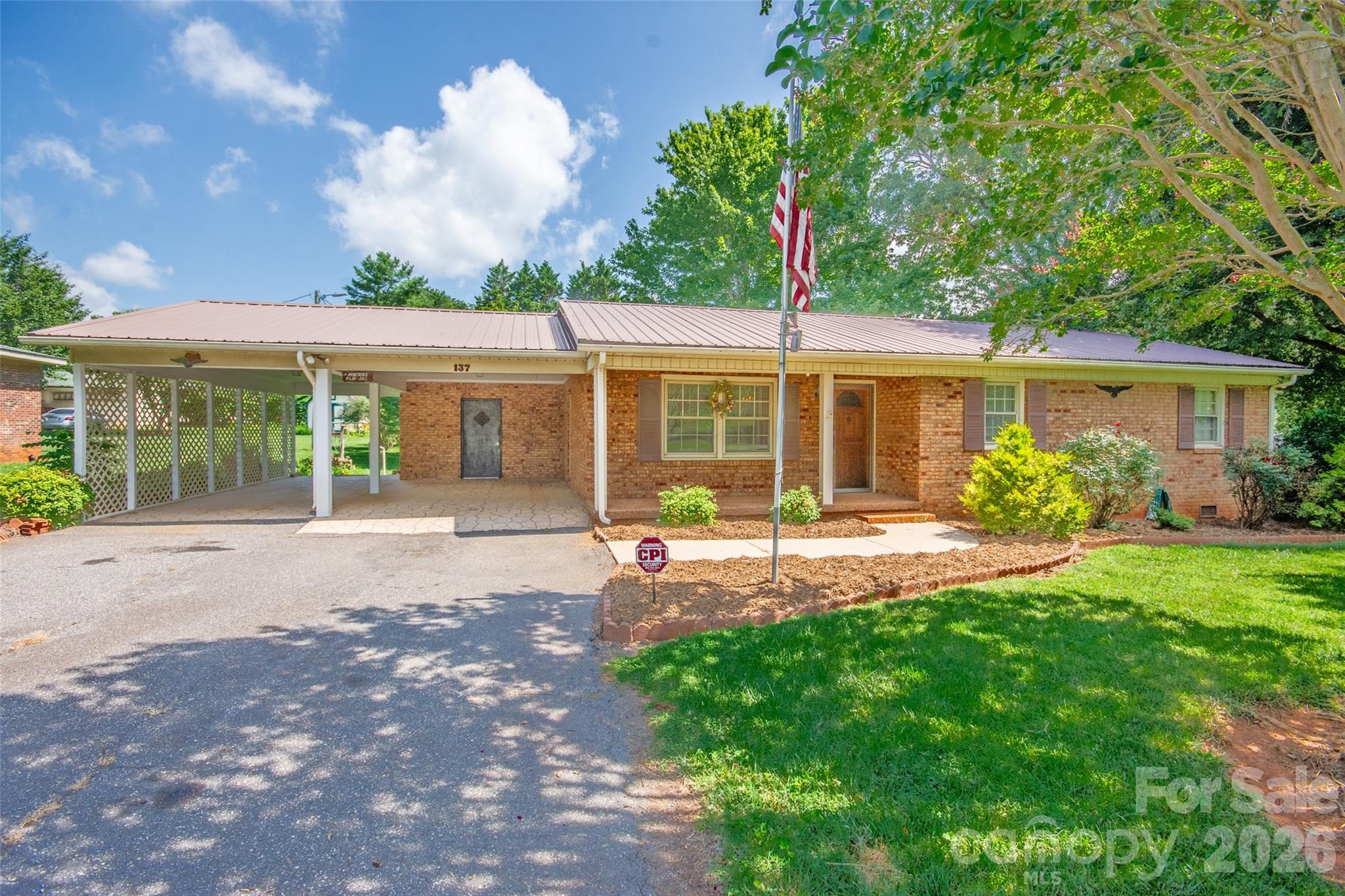 Terrific brick ranch style home in beautiful Taylorsville NC!  Home features 3 bedrooms and 2 full baths with the primary bedroom having it's own private bath.  Great sized kitchen & dining area that also features built in cabinets for extra storage or display.  Kitchen has all appliances staying and includes a kitchen island for extra workspace, cabinet storage, eating on, or you can remove it if wanting a different set up.  Spacious living room also with built ins for all of those pictures & decorations you may have!  All one level, low low maintenance home on a level lot and has a quaint back yard and includes a nice outbuilding for additional storage or lawn care equipment etc.  Enjoy sitting on the back patio in different seasons.  2 car attached carport for covered parking and convenience of getting in during rain which also makes a great outdoor gathering area when have friends/family over. There's a utility room off of the carport. This home is ready for you to come put your own touch to it and enjoy! Great location at the end of Liberty Church Rd. near Millersville Rd.  Beautiful Alexander County!