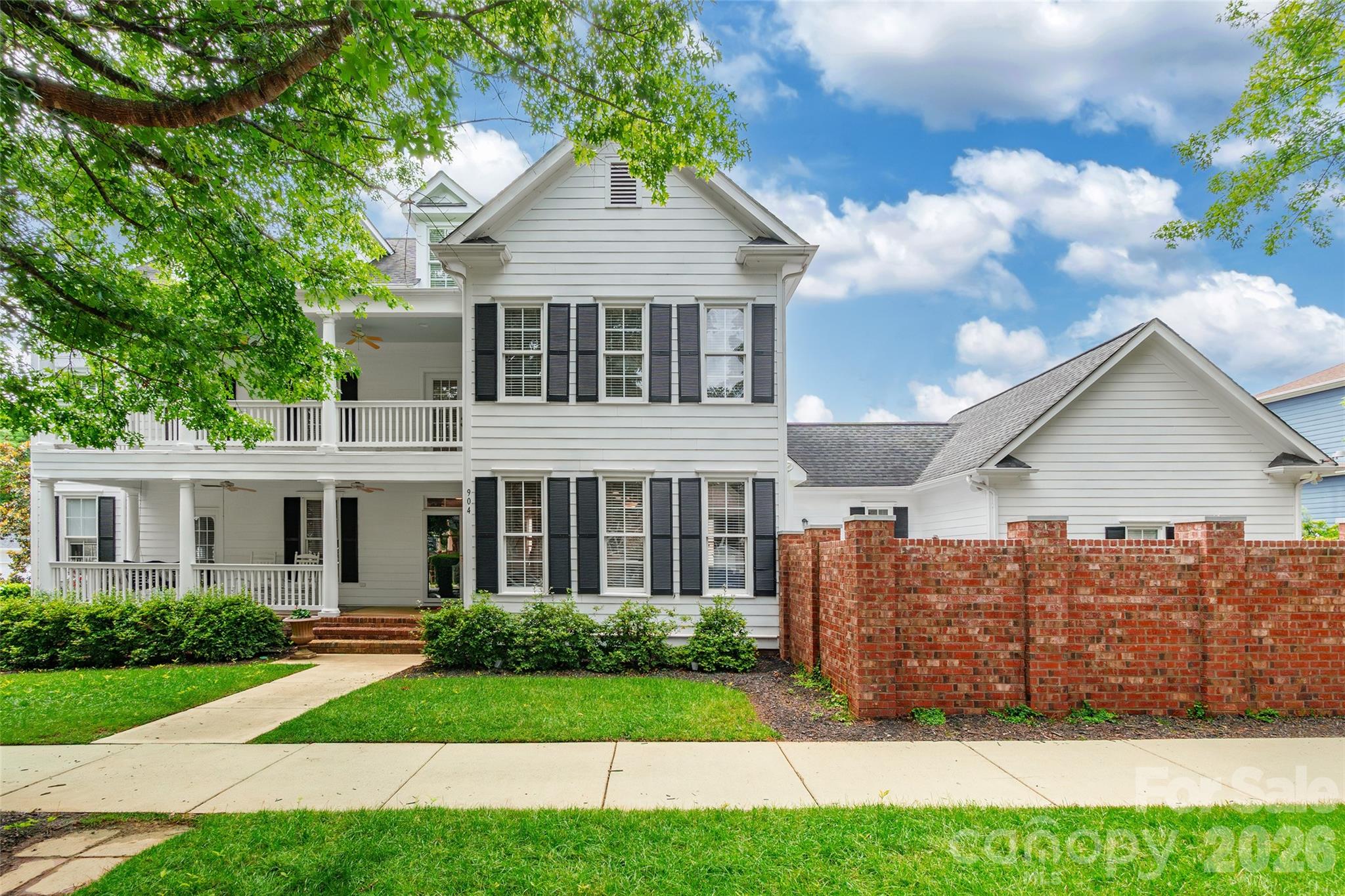 Classic Charleston-style home featuring double front porches and timeless Southern charm in the desirable Baxter community. This spacious 4-bedroom, 3.5-bath home offers a thoughtfully designed layout with a formal dining room, dedicated office, and a versatile bonus room perfect for a media space, playroom, or additional living area. Enjoy comfortable everyday living along with inviting spaces for entertaining, all wrapped in elegant architectural character. Additional features include in-ground irrigation and access to outstanding community amenities including a pool, playground, and tennis courts.