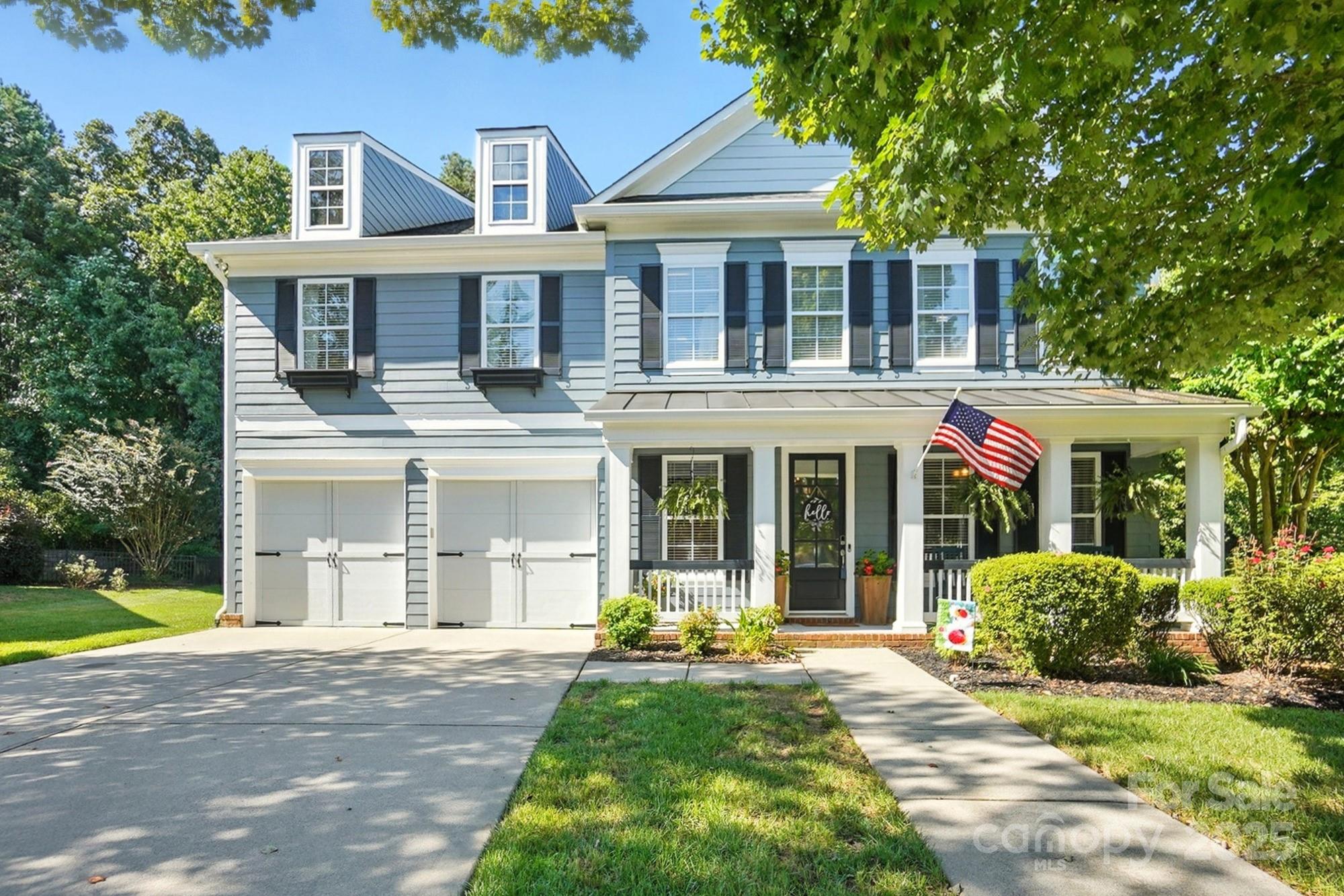 This is a stunning meticulous home! Exceptional curb appeal, a private back yard, spacious rooms & stylish neutral finishes. Every room is generously sized. Upon entering, you're welcomed by a large office with french doors. The formal dining room features classic wains coating & lots of natural light. The kitchen is a chef's dream, complete with a large island, breakfast bar, a gas stove & breakfast area. The kitchen flows seamlessly into great room with beautiful built ins and a beautiful fireplace. Just off of the great room is a lovely 3 season room, fully permitted & added for enjoyment. Spacious laundry room with cabinetry & a garage with ample storage.  The Primary bedroom offers wains coating, a tray ceiling, and a breath taking primary bath. All bedrooms are extremely large! All bedrooms have walk ins!  Upstairs, there is a large loft with a fantastic bar and cabinets. Step outside to a paver patio overlooking a wooded back drop - perfect for relaxing or entertaining. Location is amazing and lots of amenities. Seller is willing to help with closing costs with acceptable offer. Home warranty will be provided for this home as well.