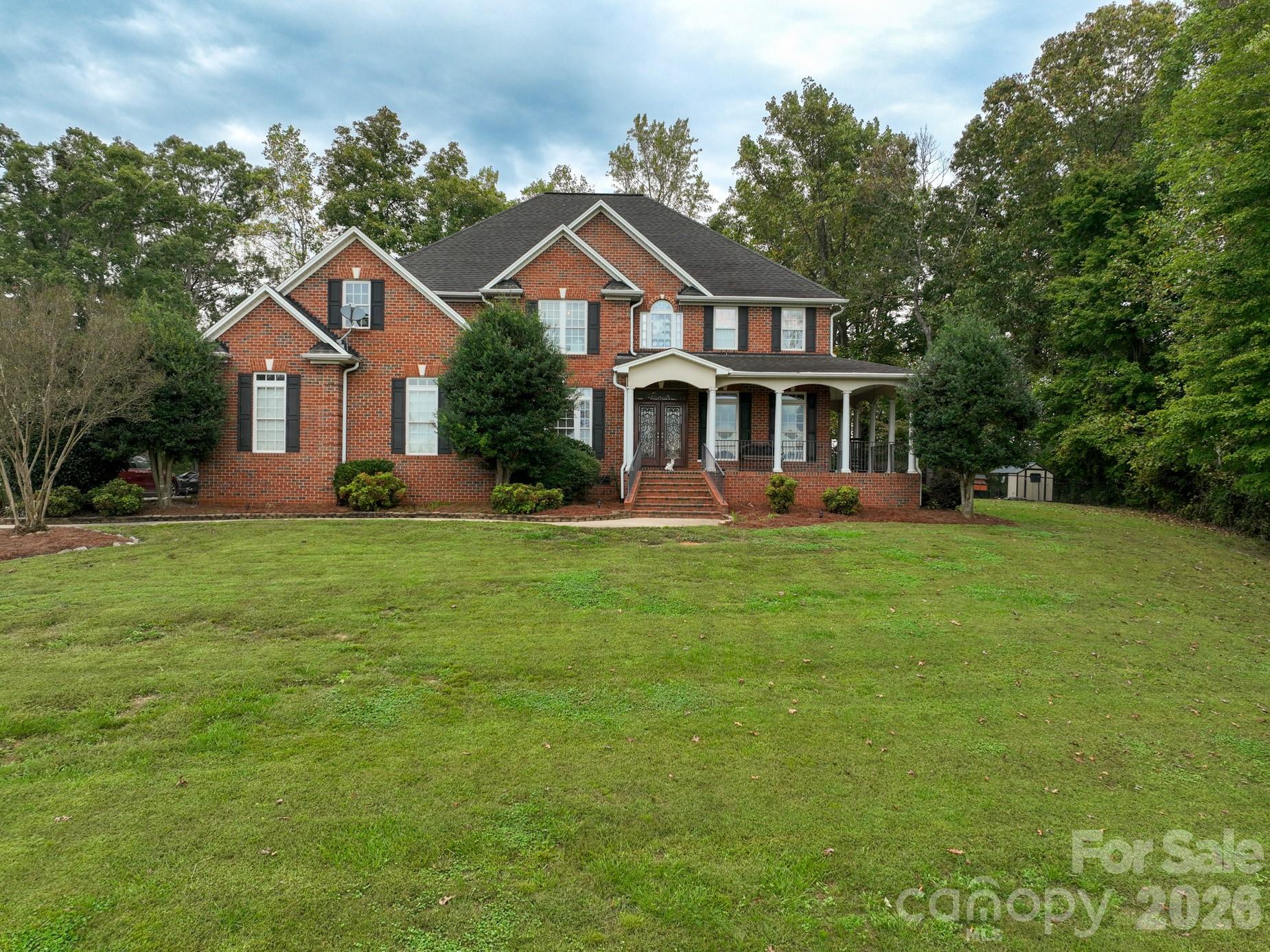 Fabulous 5 Bedroom 4 bath home atop a large hill.  The view from the home is amazing.  Entering the home you will be impressed by the high ceilings and open floorplan.  Everything is luxury in this home. Designer kitchen is a chef's delight.   One of Kings Mountain's finest homes located in the country but close to Kings Mountain and Shelby.  Fenced backyard is perfect for a private retreat.  Relax in your jacuzzi or just enjoy the natural setting.  You will want this home as you drive up the stately driveway to the top of the hill.  Your home-a showplace!