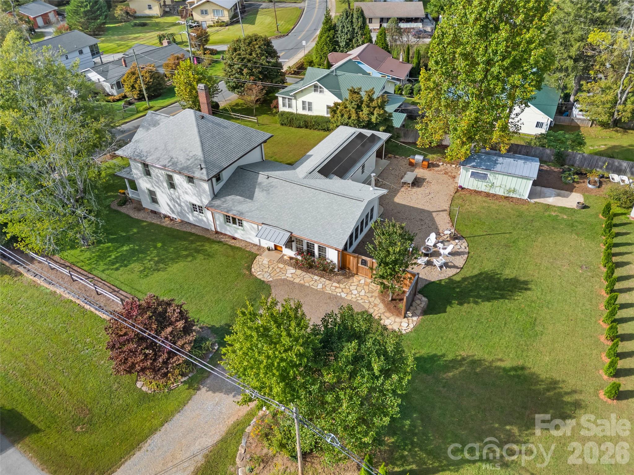 Few things compare to the timeless character of a historic home. Particularly when combined with thoughtful and lasting modernization for future generations to enjoy. From the moment you enter, you'll be enchanted by a remarkable old English style kitchen with scullery - adorned with soapstone countertops, Thermador appliances, and showpiece accents. Attention to detail and high-end finishes can be found in every nook and cranny, from quartersawn oak cabinetry, heated marble floors, Bevolo gas lantern and custom Ipe grill station. Some additional improvements include standing seam metal roof, LP Smart Siding, encapsulated basement, HVAC, plumbing and electrical updates. All of which have created a home that is the embodiment of old-world charm with modern comforts. It's also worth noting that when this home was constructed the site was likely selected for its level nature and elevation allowing for excellent natural light and easy drainage. 505 N Country Club Rd is an exceptional opportunity for any buyer. CHECKOUT THE VIRTUAL TOUR / PROPERTY VIDEO! Schedule your showing today.