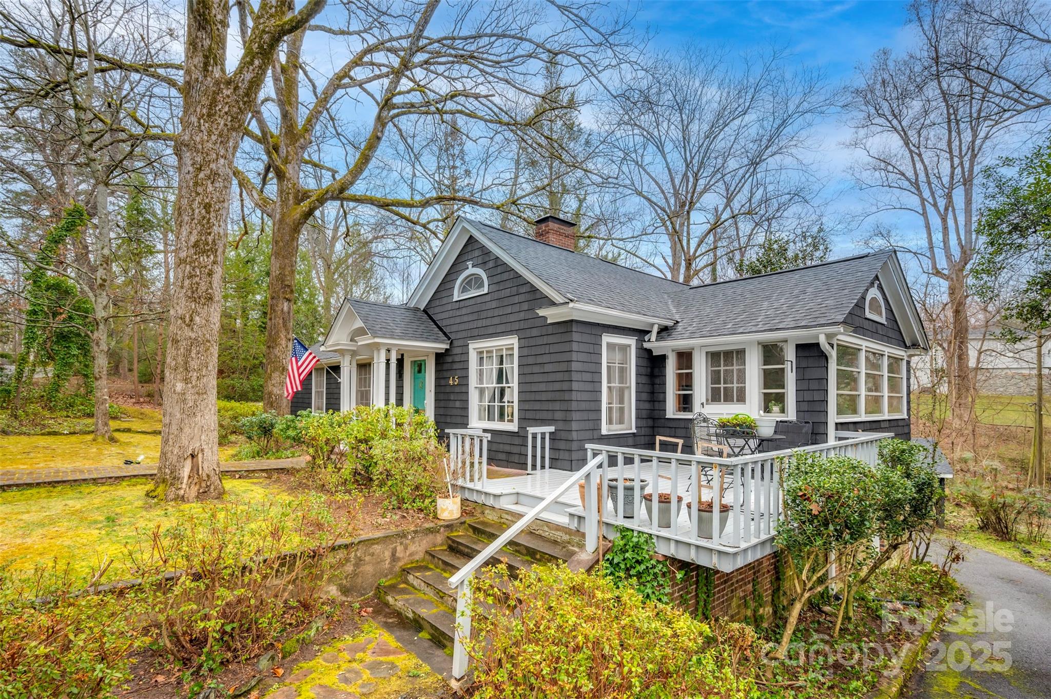 A classic Tryon, cedar shake cottage right in the middle of Tryon, walkable to everything, and just steps away from the historic Pine Crest Inn, currently being lovingly restored. Brand new architectural shingle roof installed and exterior freshly painted. Interior features narrow gauge oak floors, all one-level living, and 1,434 s.f. of walk-out basement available for recreation and storage.