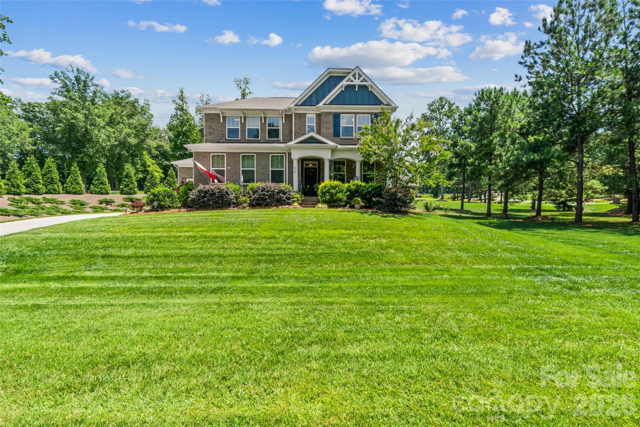 Welcome to this meticulously maintained home in a quiet, sought-after Rock Hill neighborhood lined with beautiful custom and semi-custom homes, close enough to everyday conveniences yet tucked away with a peaceful, tree-lined feel. Situated on a gorgeous 1.04-acre corner lot, this property boasts lush lawn space, a shaded natural tree area, and open greenspace, all maintained effortlessly thanks to a full irrigation network. Inside, the thoughtfully designed floor plan offers a main-floor primary suite for single-level living ease, while upstairs you'll find additional bedrooms (4 bedrooms total per the home's septic permit, with a 5th flex room upstairs with closet) plus a generous loft space perfect for a second living area, playroom, or home office. Upstairs also features a partially finished, heavily insulated 20x8 walk-in storage area, ideal for keeping the home organized year-round. Outdoor living is a highlight here, with both a fully screened-in back porch and a separate covered patio area, perfect for enjoying South Carolina evenings rain or shine. This home has been lovingly cared for by an engineer-owner with meticulous attention to detail. Every service has been kept on schedule, with complete maintenance records available and up to date, giving buyers true peace of mind about the home's condition. A whole-house Generac generator adds even more security, keeping the home powered through any SC storm. From the landscaping to the systems to the layout itself, no detail has been overlooked in making this home both beautiful and easy to live in—schedule your showing today to experience it for yourself.