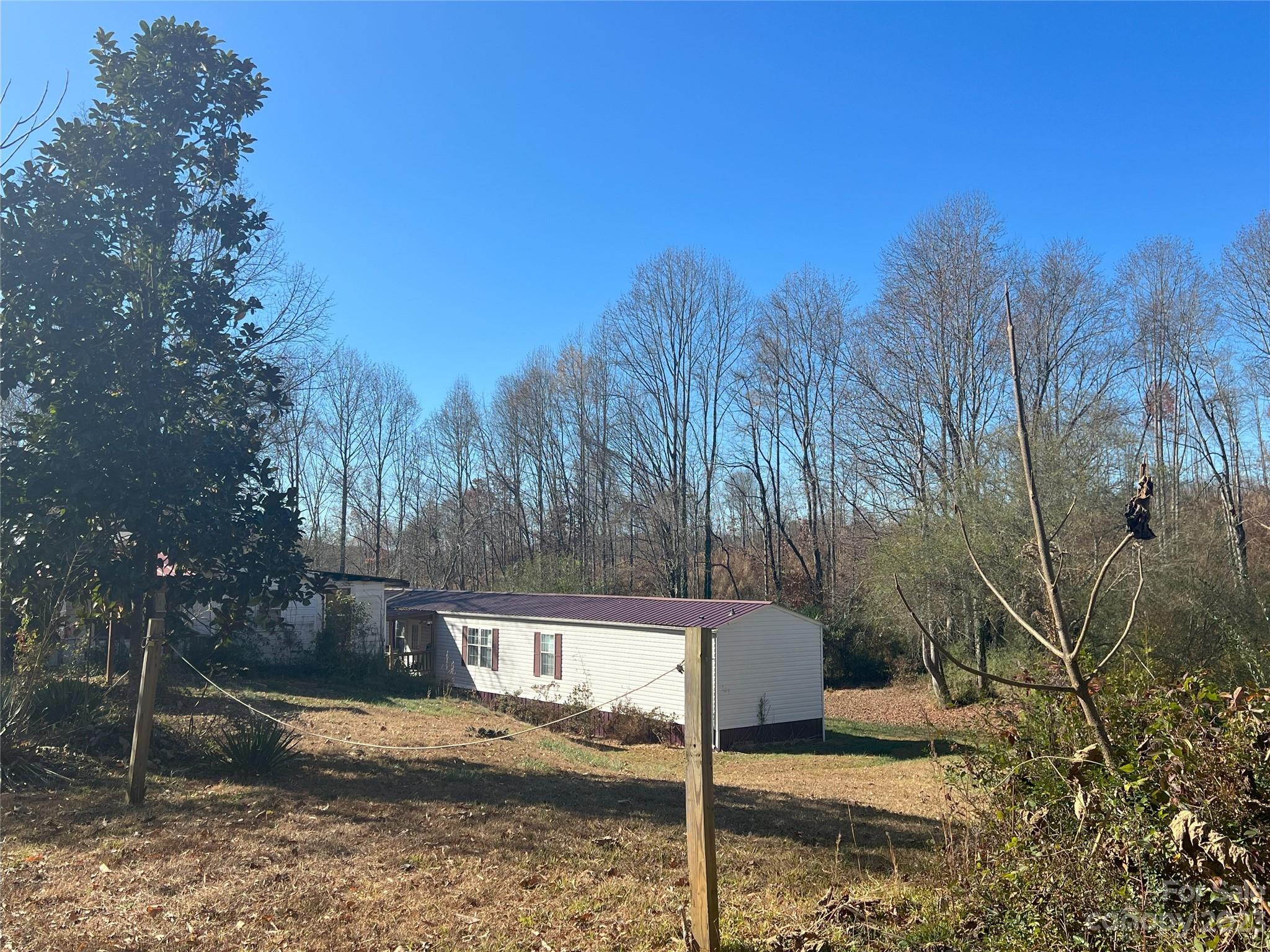 If you are looking for a starter home or a nice property for a rental opportunity this is definitely what you are looking for. It is a single wide mobile home with 3 bedrooms and two bathrooms and it comes complete with range, fridge, washer and dryer. Has 1.56 acres approximately. Home is close to city limits and lots of things to do close by or businesses close by. Must see to appreciate!