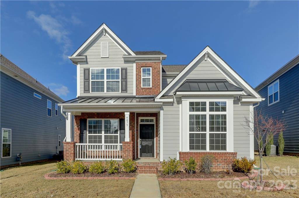 Beautiful home at the highly desired Cameron Creek community. Conveniently located off Hwy 160 in Tega Cay, SC. Near glamorous shopping, dining, parks, trails and Lake Wiley. It is just a short commute to Charlotte, NC.  Award-winning Fort Mill schools!
M/I home popular floor plan Garfield, with master suite downstairs, 3 bedrooms & a bonus loft upstairs, 3 full and 1 half bath. Magnificent hardwood floor throughout the main living area on the first floor. Kitchen has gorgeous Luna Pearl granite counters top and a marvelous big island, plus SS appliances, gas range, and premium light fixtures. Stunning primary suite complete with spa-like bath and large walk-in closet. Great loft space on the 2nd floor is perfect for a play area or home office! Beautiful front porch and covered rear patio for you to enjoy a morning coffee, a brunch party, or an evening meditation. Attached 2 car garage in the back.  Don’t miss this opportunity!!