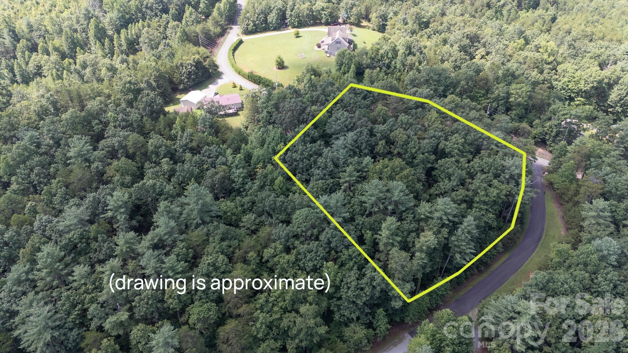 Enjoy peaceful country living in the gated community of Blackberry Creek.   residential lot features 1.92-acre residential lot can offer beautiful long range views once you have cleared and built your home.  The community offers a peaceful and serene setting, making it a perfect place to build your home or private vacation retreat.  Conveniently located at the entrance of the back gate first lot on your right, offering easy access and excellent positioning within the community. The road is paved along the full frontage of the property adding convenience and value.  Experience the tranquility of mountain living while still being part of a thoughtfully designed community.
Ideally located just minutes from I-40, providing easy access to Black Mountain, Morganton, Hickory, and Asheville-giving you the perfect balance of privacy and convenience.